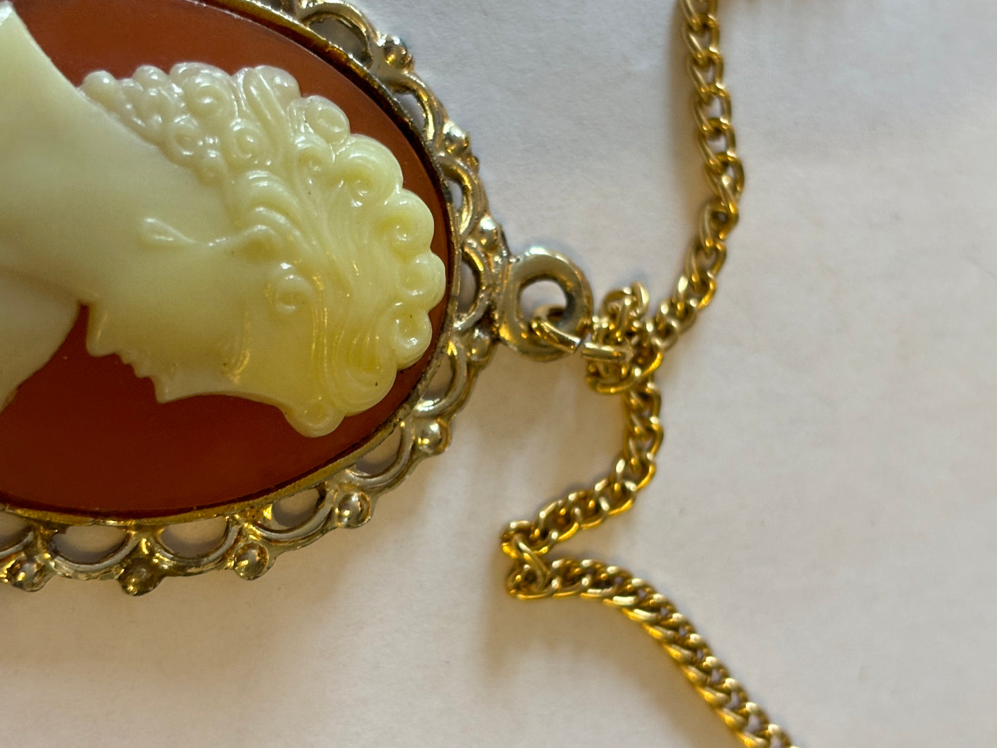 Long gold metal necklace with Cameo pendant