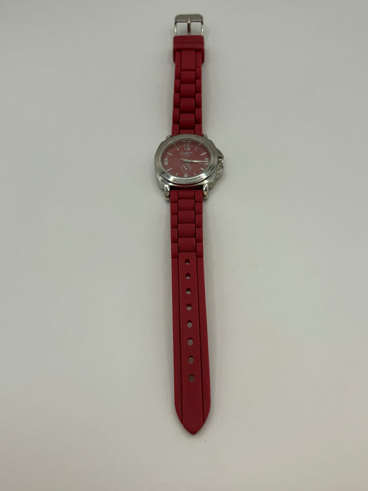 Pink rubber Cotton Traders and silver wristwatch