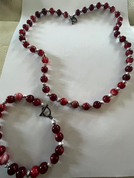 Red marbled bead necklace with silver spacers and matching bracelet