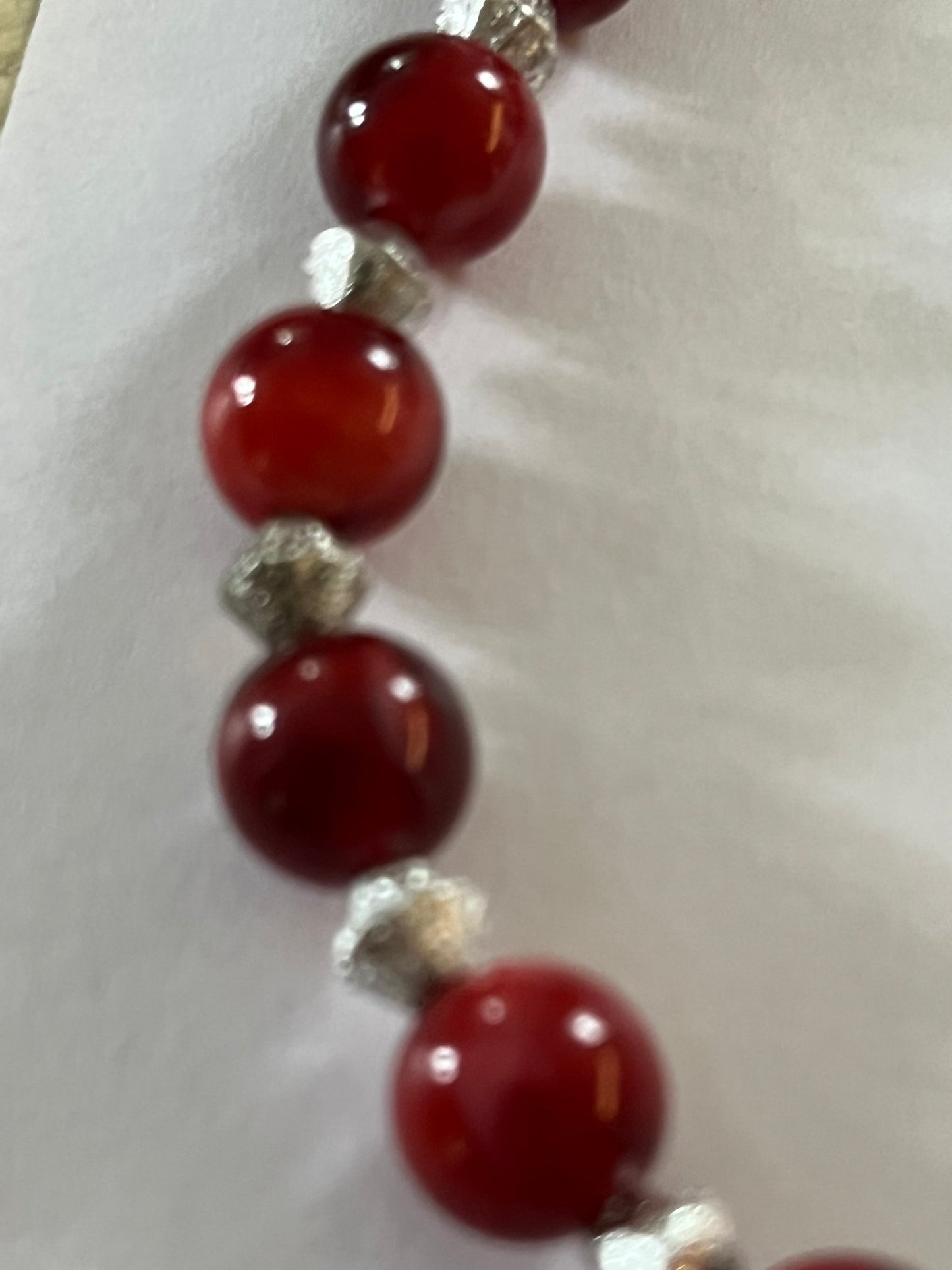 Red marbled bead necklace with silver spacers and matching bracelet