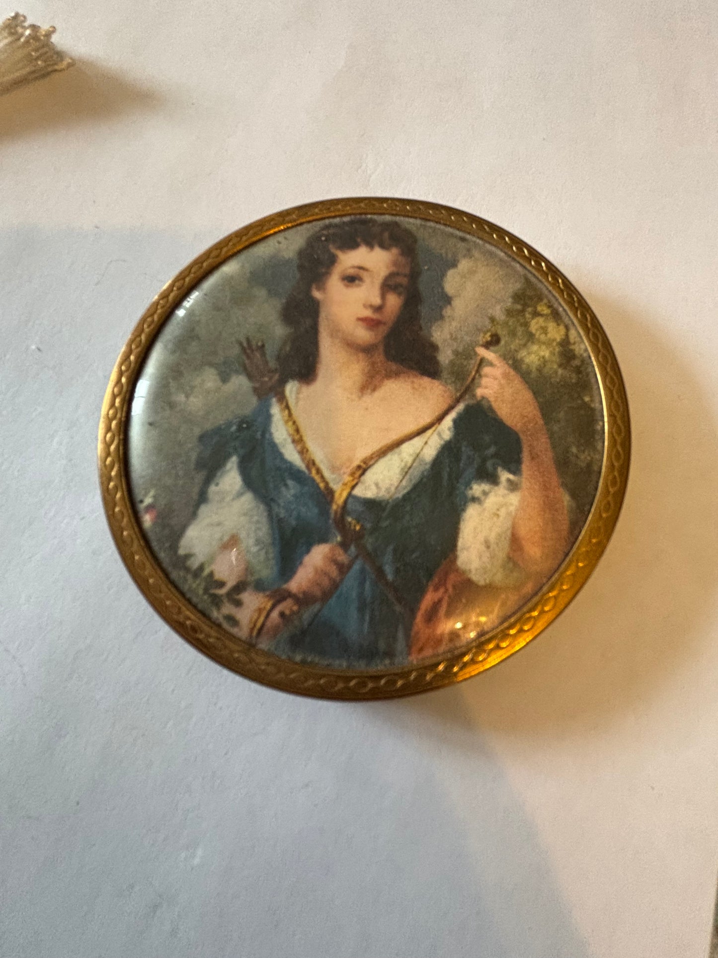 Brass metal round compact with victorian portrait decoration