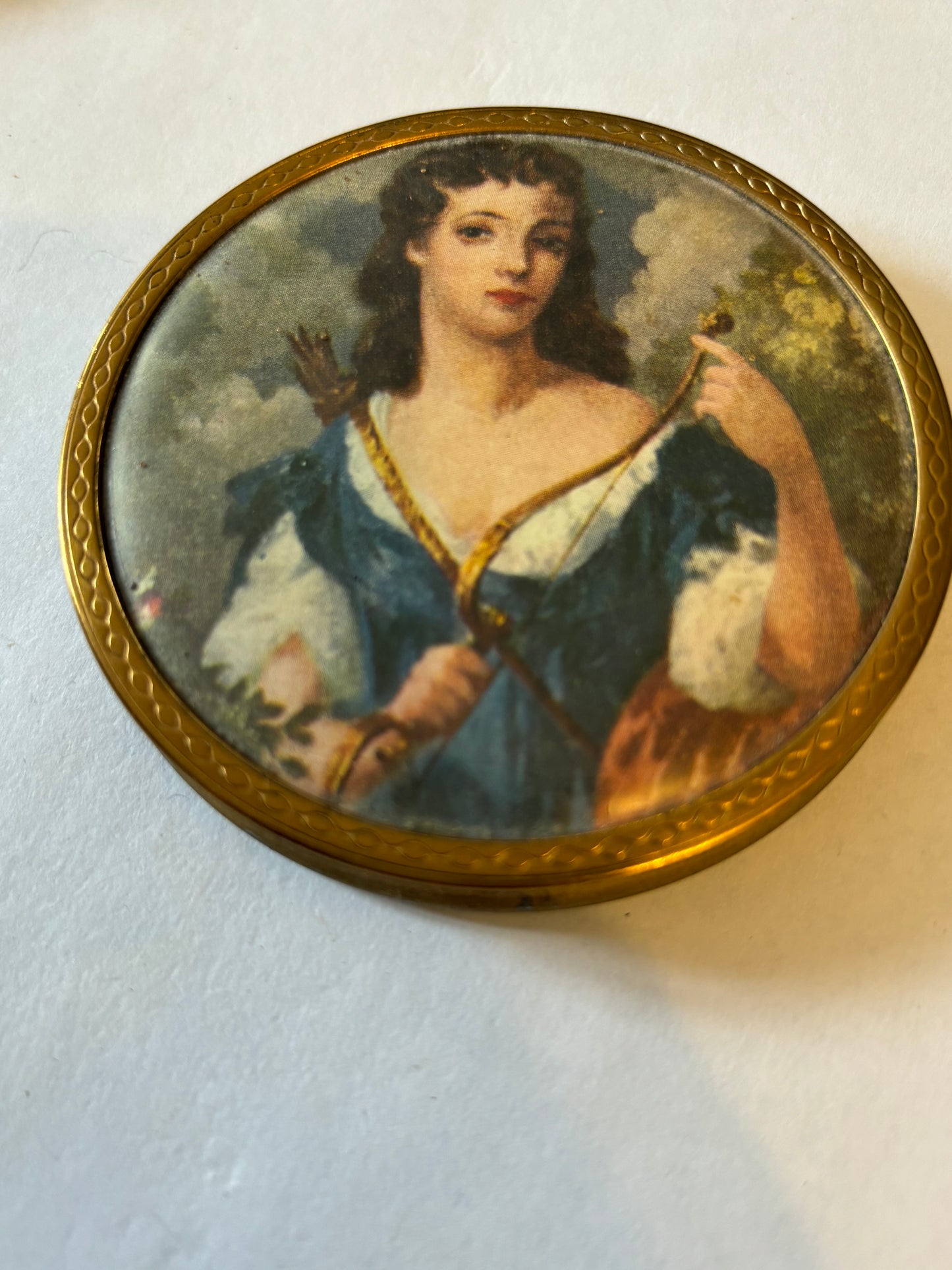 Brass metal round compact with victorian portrait decoration