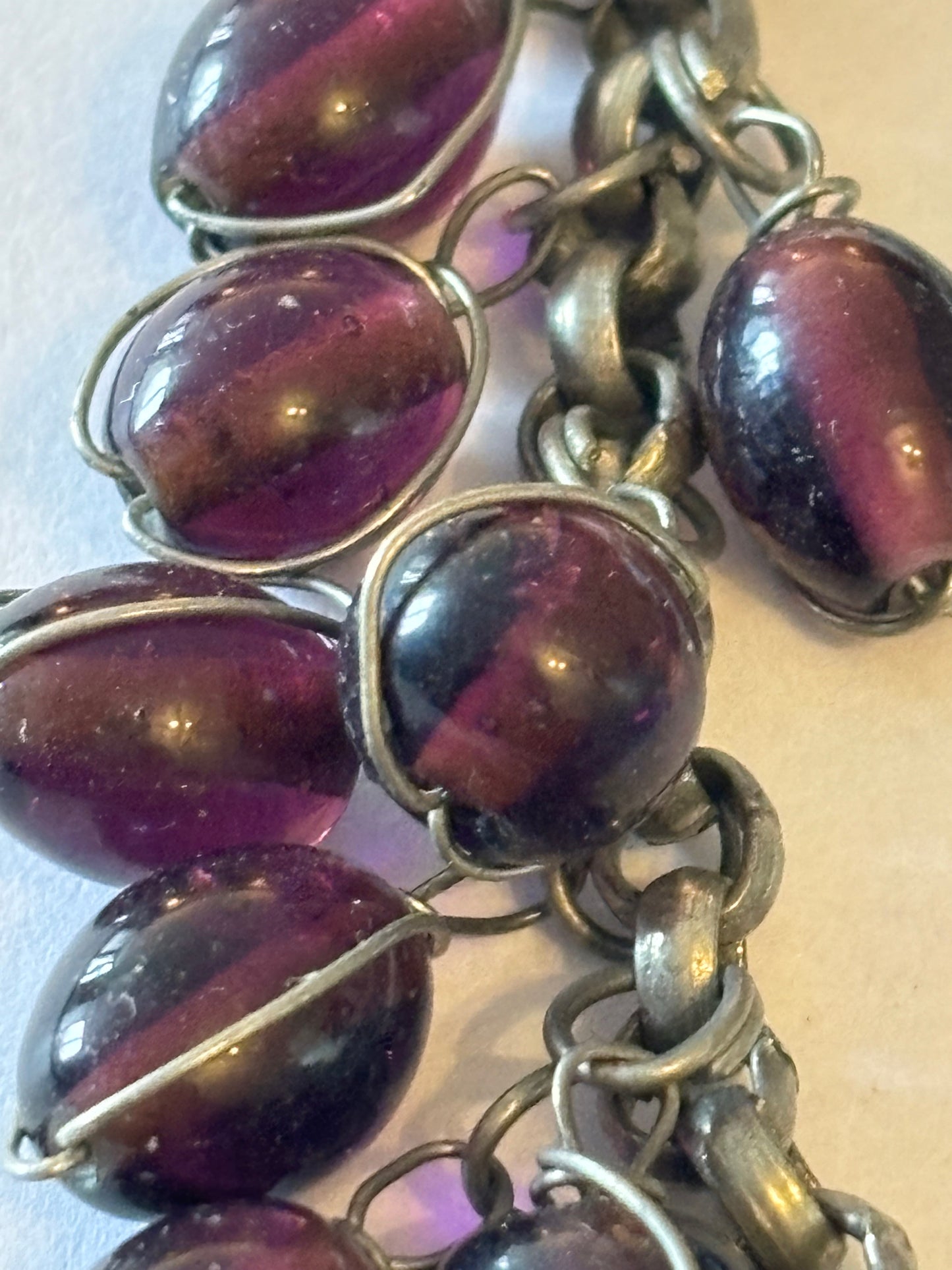 Silver metal T-Bar bracelet with dangle purple oval beads