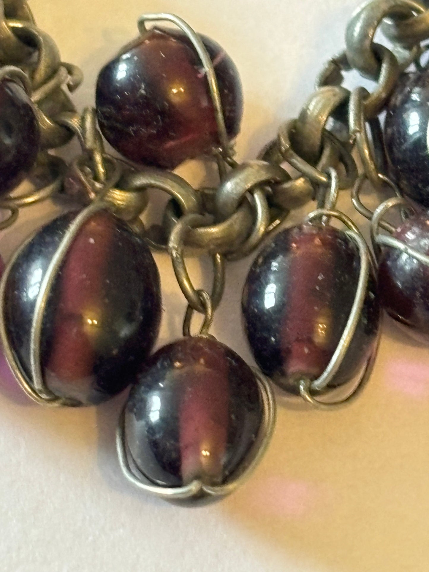 Silver metal T-Bar bracelet with dangle purple oval beads