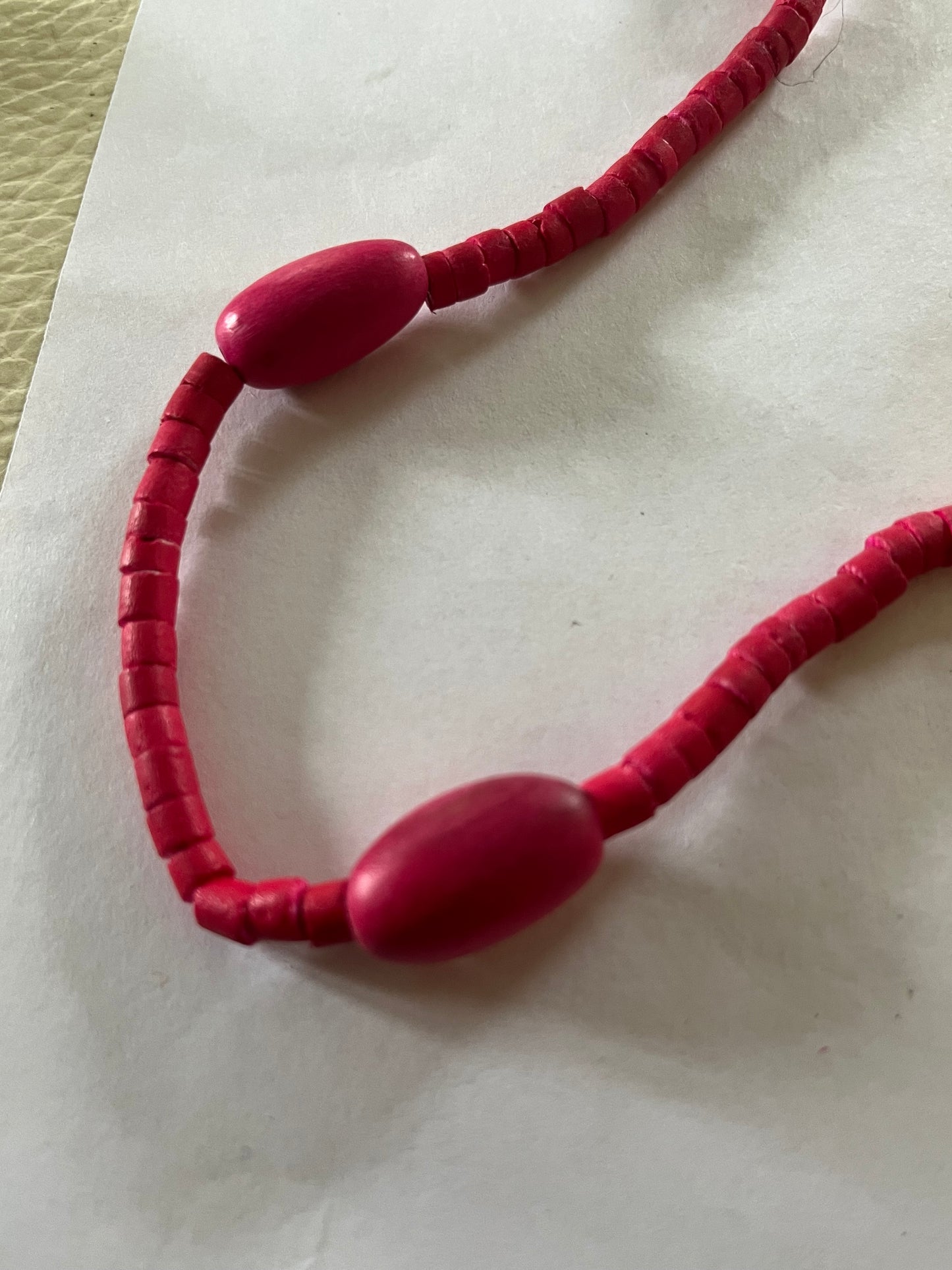 Long pink wooden bead necklace