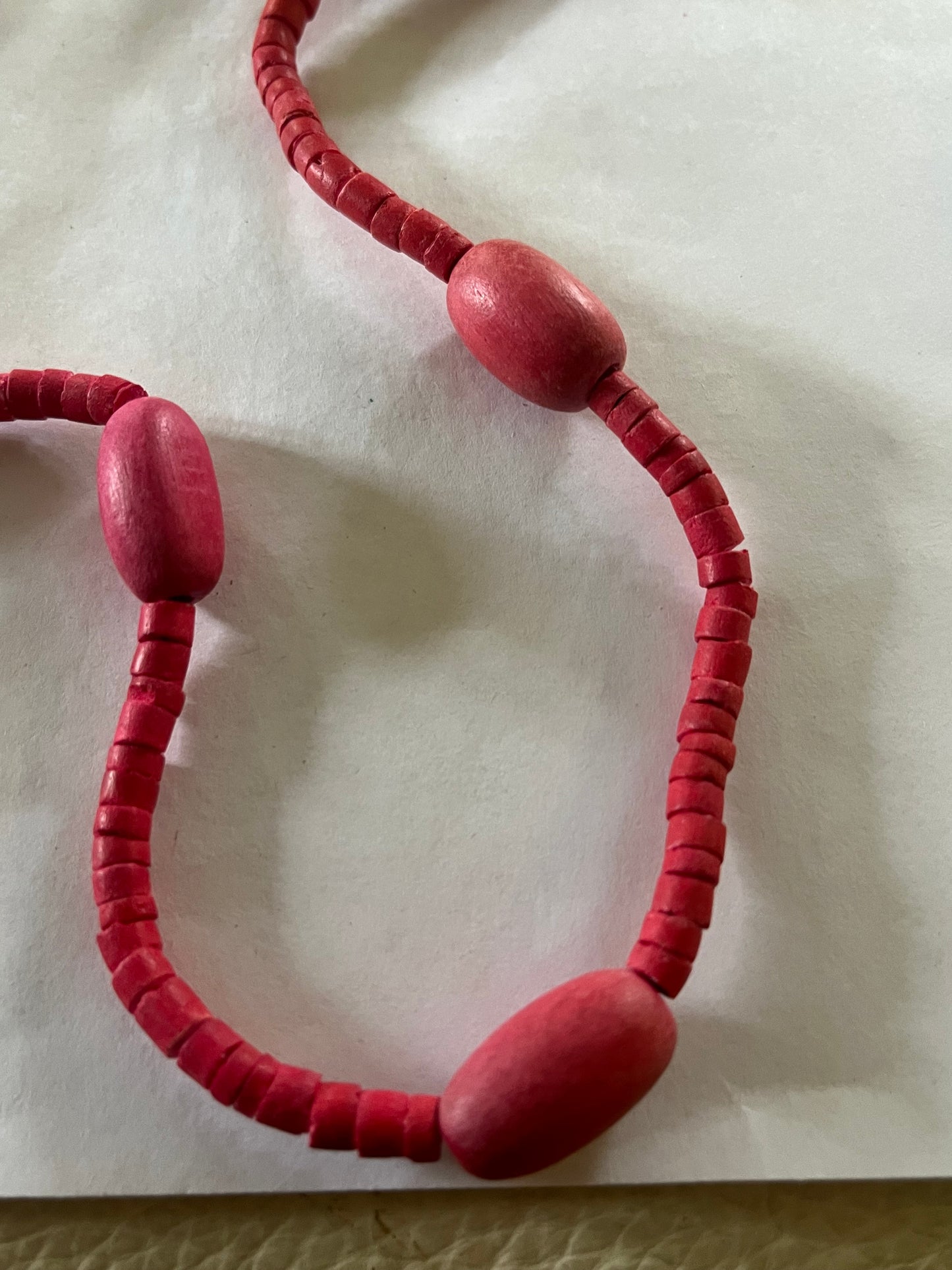 Long pink wooden bead necklace