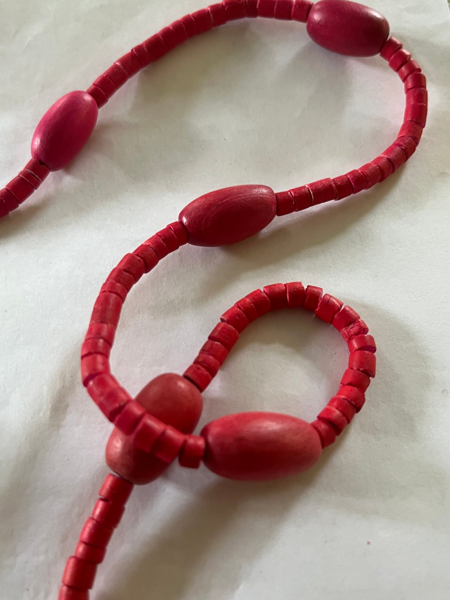 Long pink wooden bead necklace