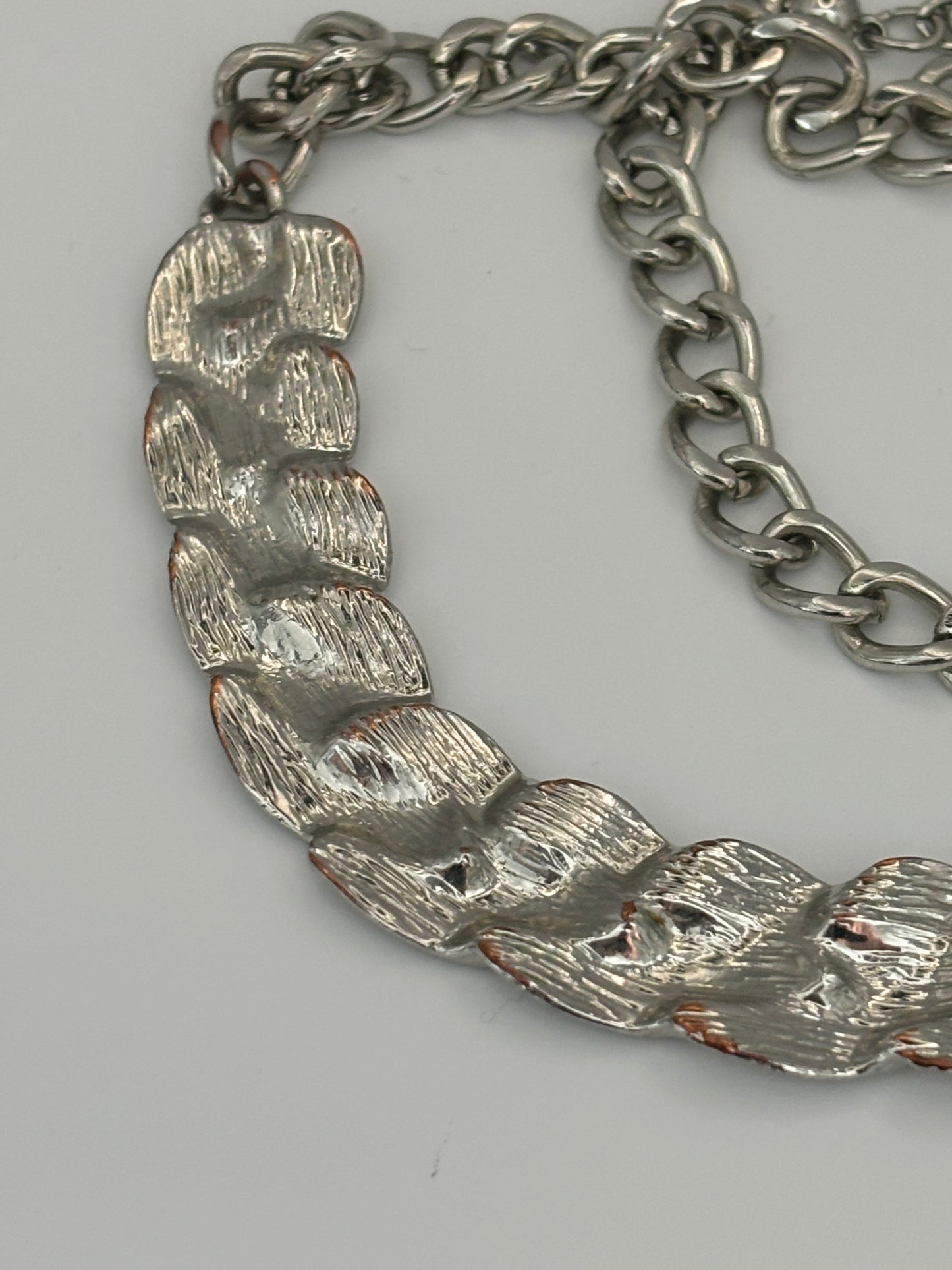 Chunky silver chain necklace with silver weave curved bar pendant