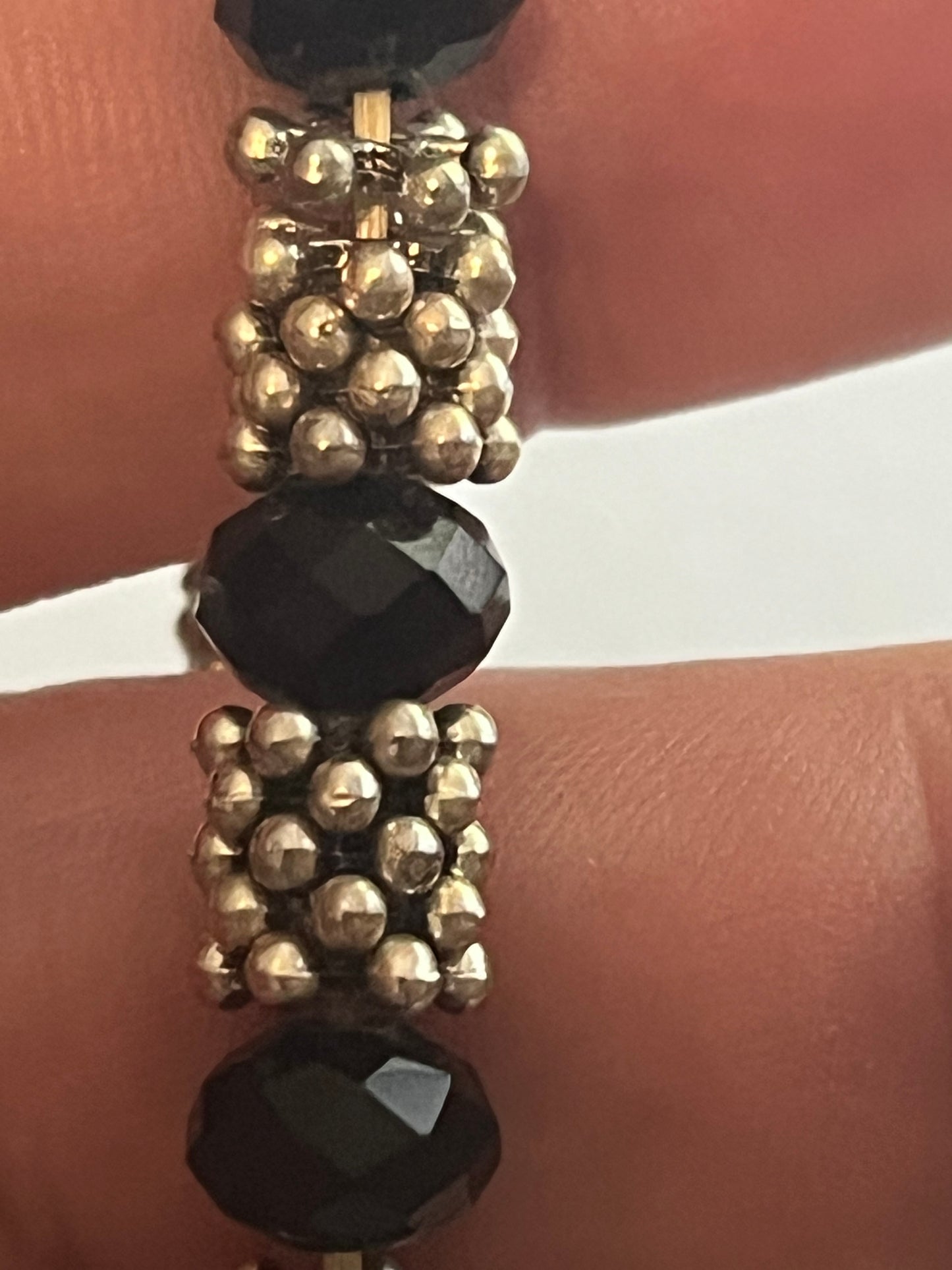 Silver bobble and black bead stretch bracelet