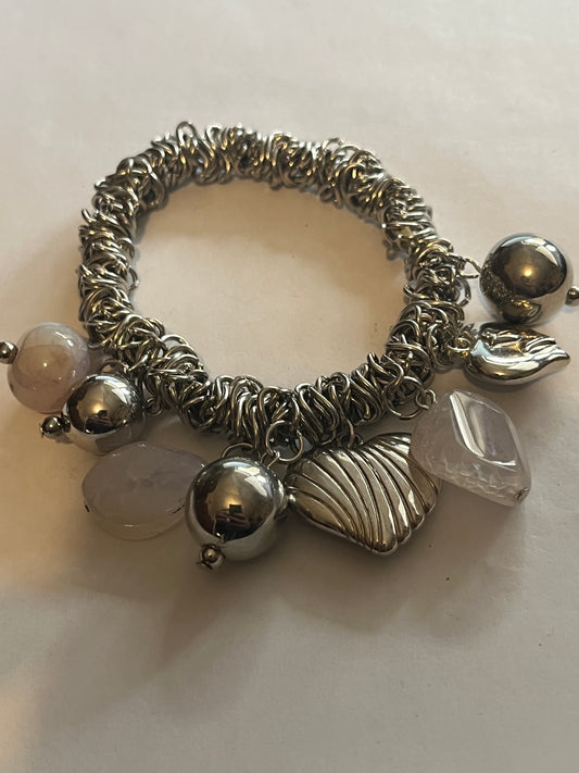 Uneven tight rings bracelet with beads and charms