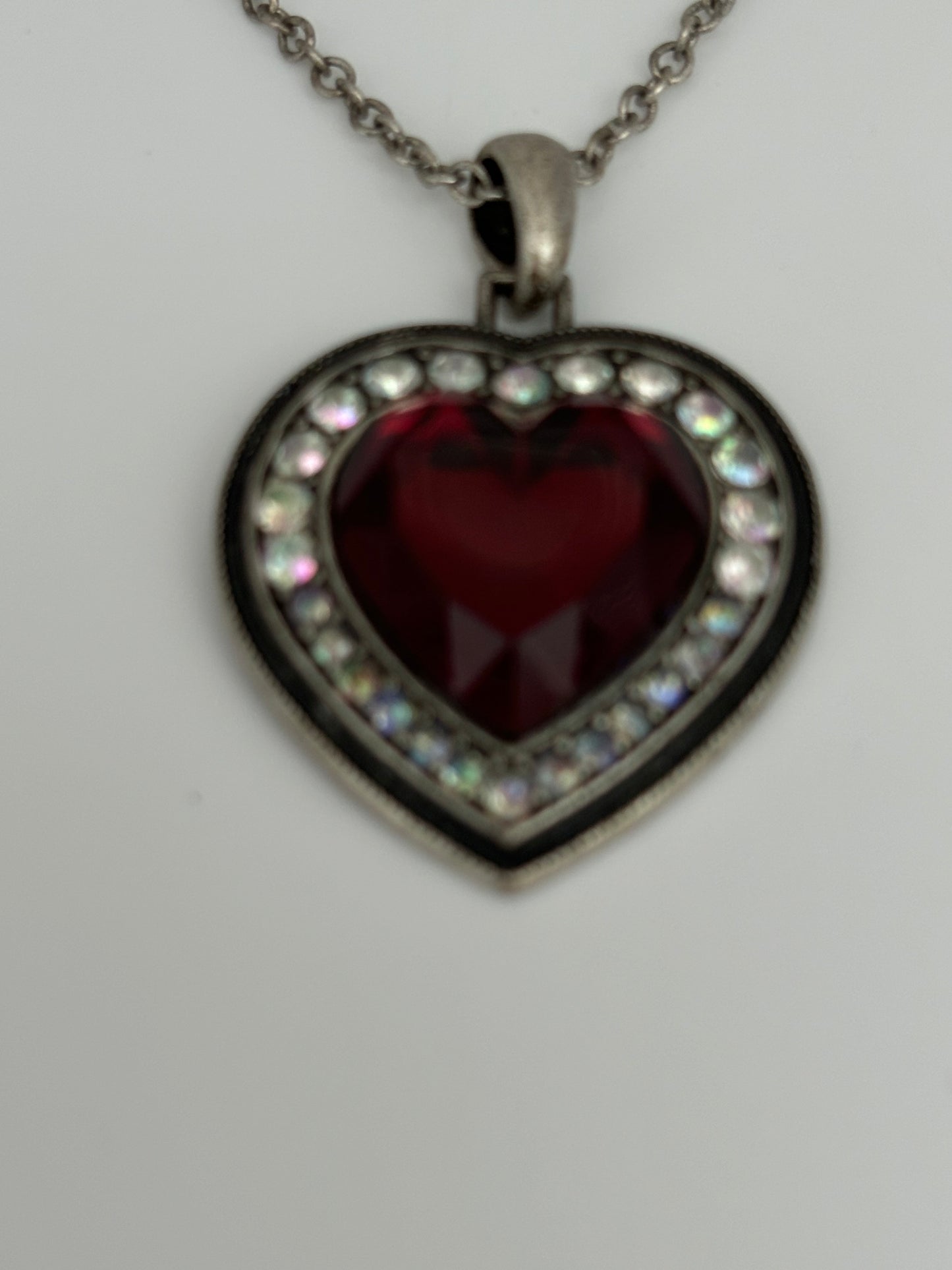 Silver necklace with red stone heart pendant