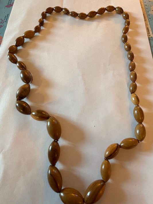 Light wooden seed shaped bead necklace