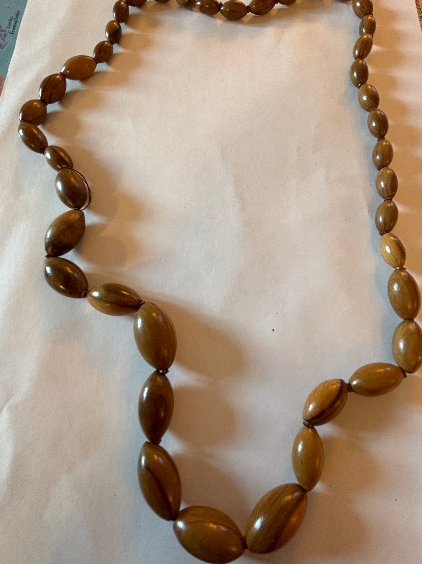 Light wooden seed shaped bead necklace