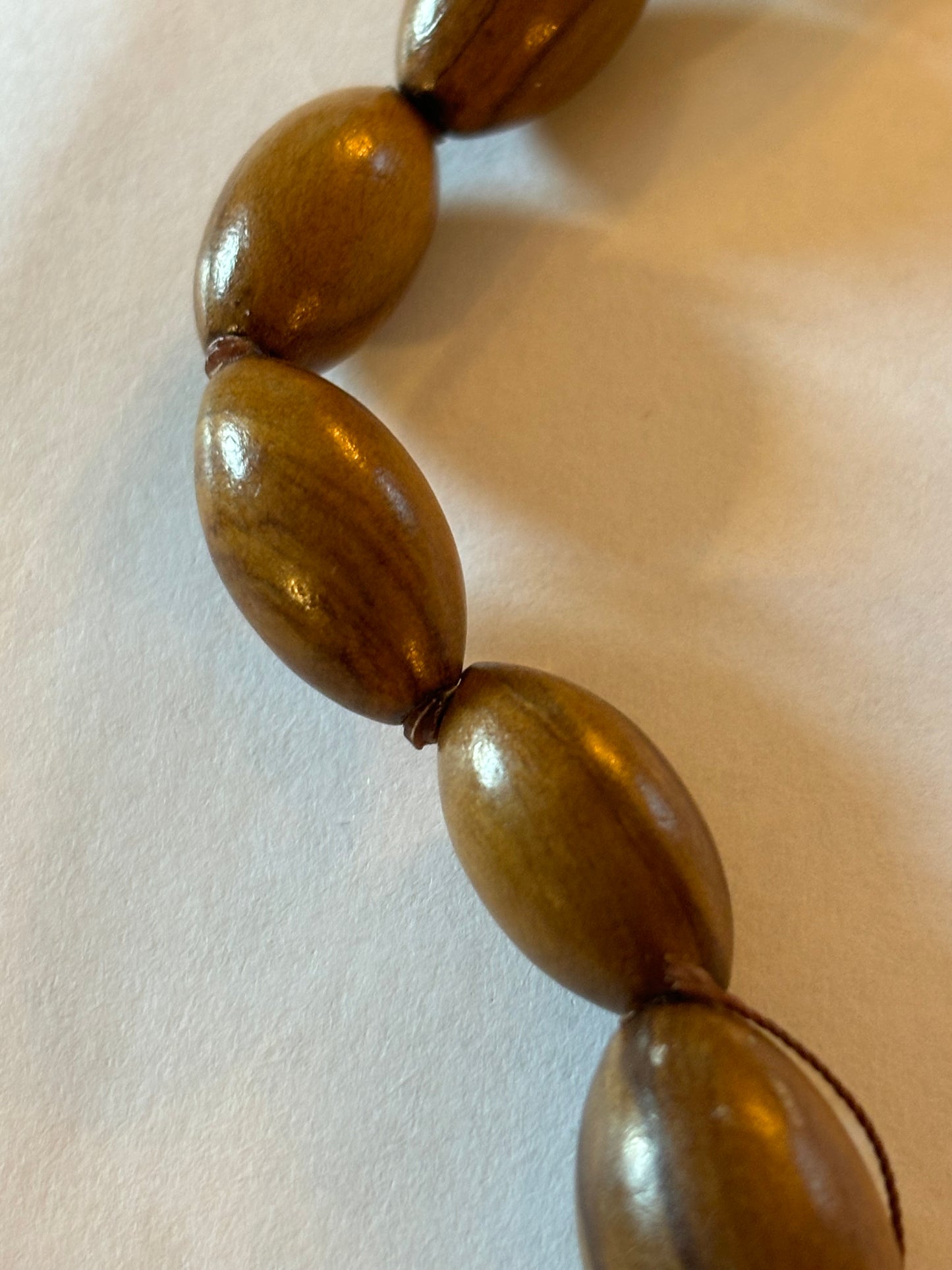 Light wooden seed shaped bead necklace