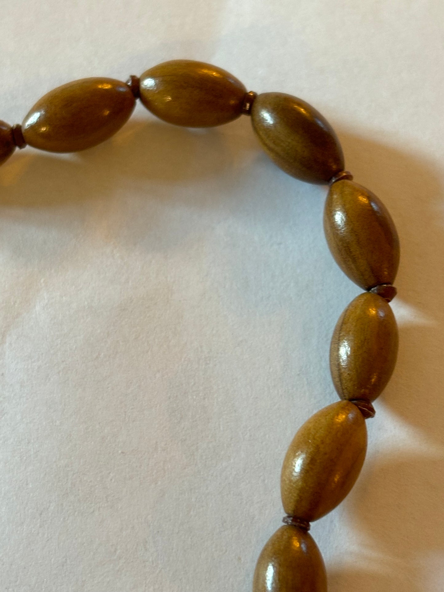 Light wooden seed shaped bead necklace