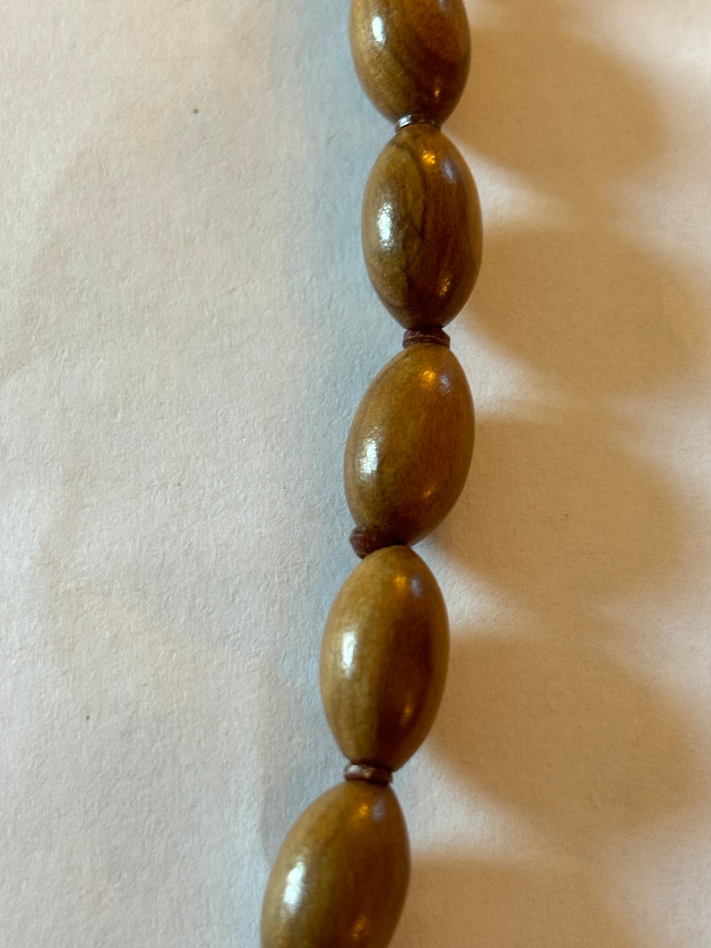 Light wooden seed shaped bead necklace