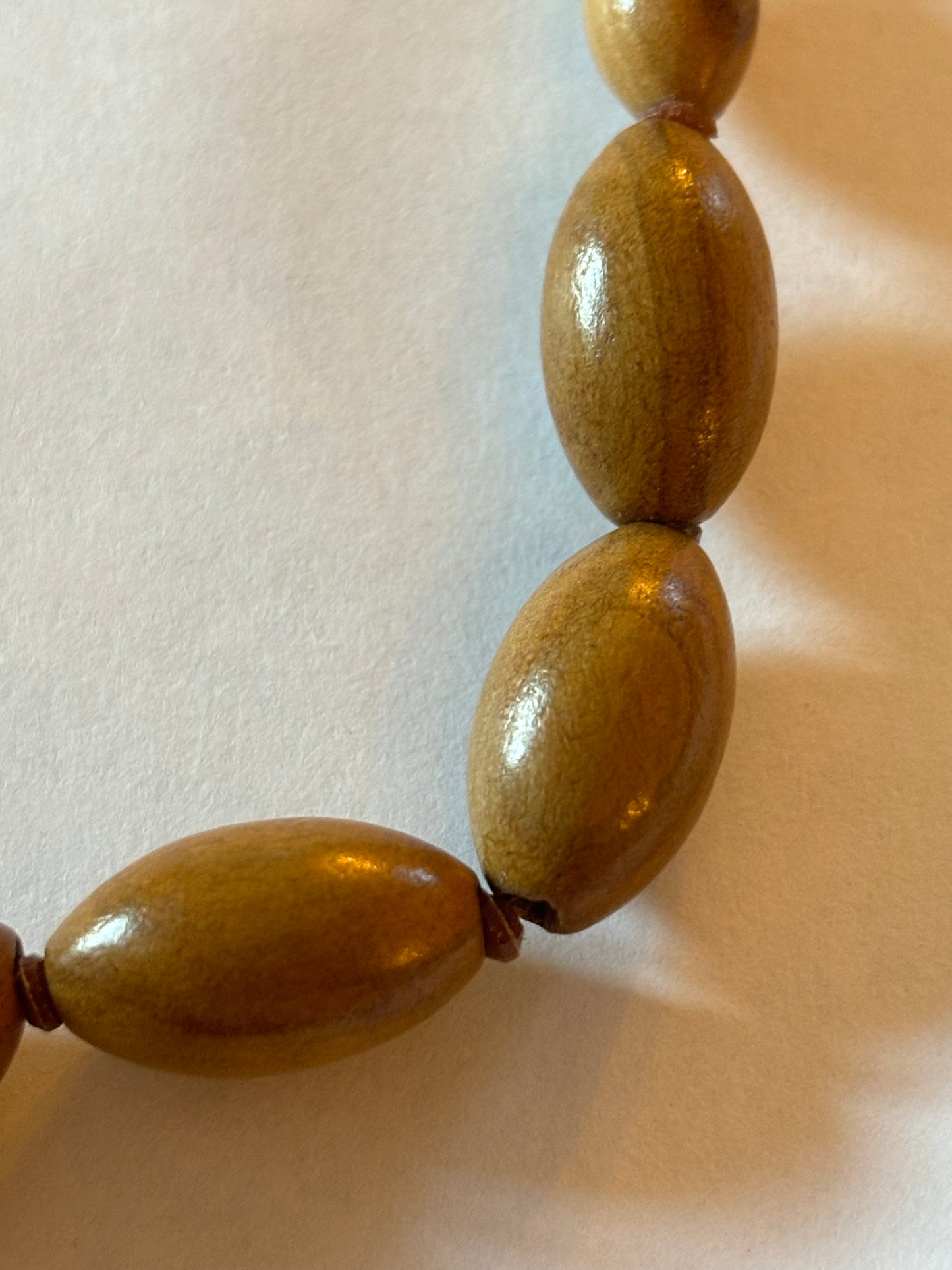 Light wooden seed shaped bead necklace