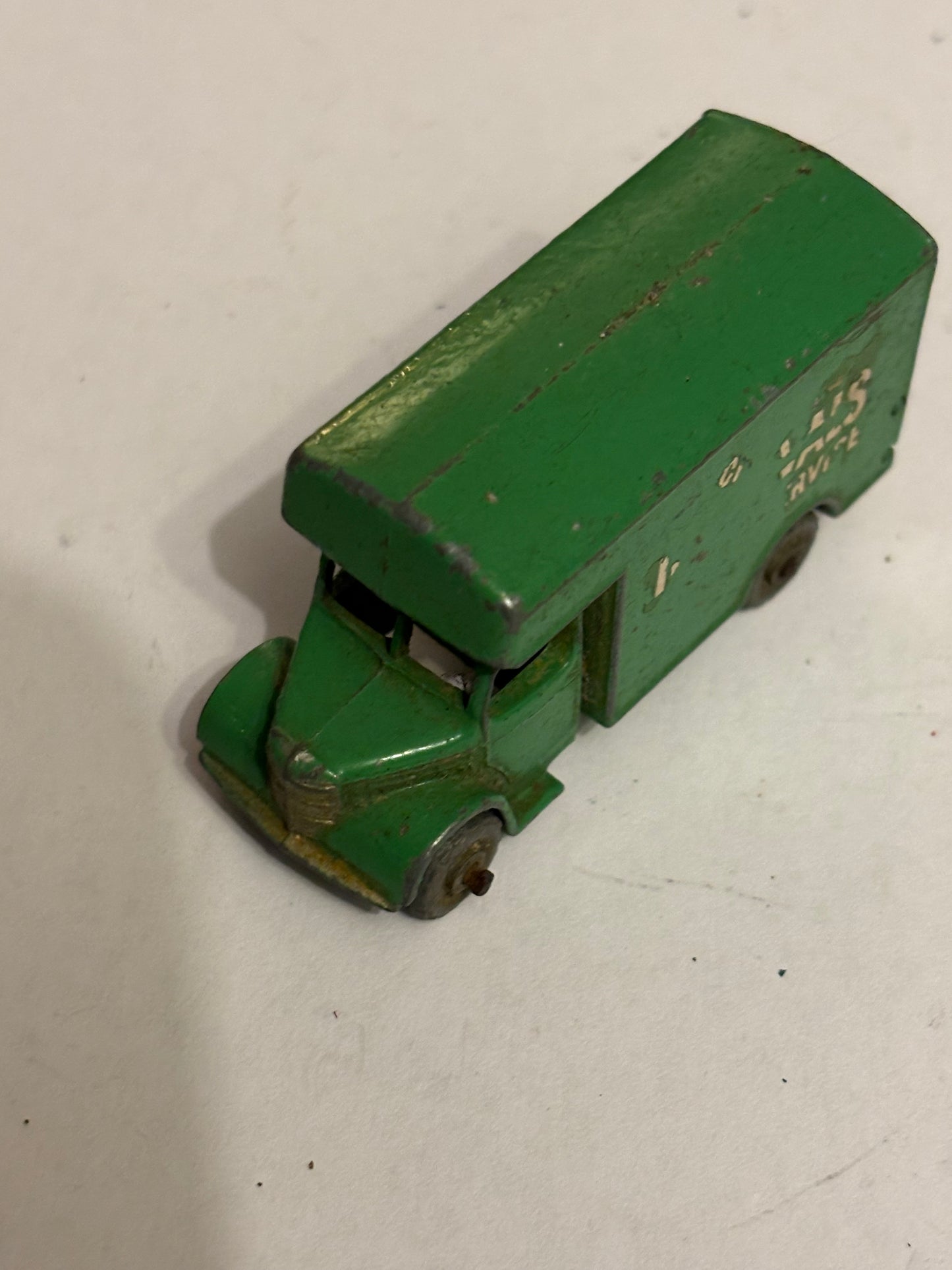 Vintage small green matchbox removals van