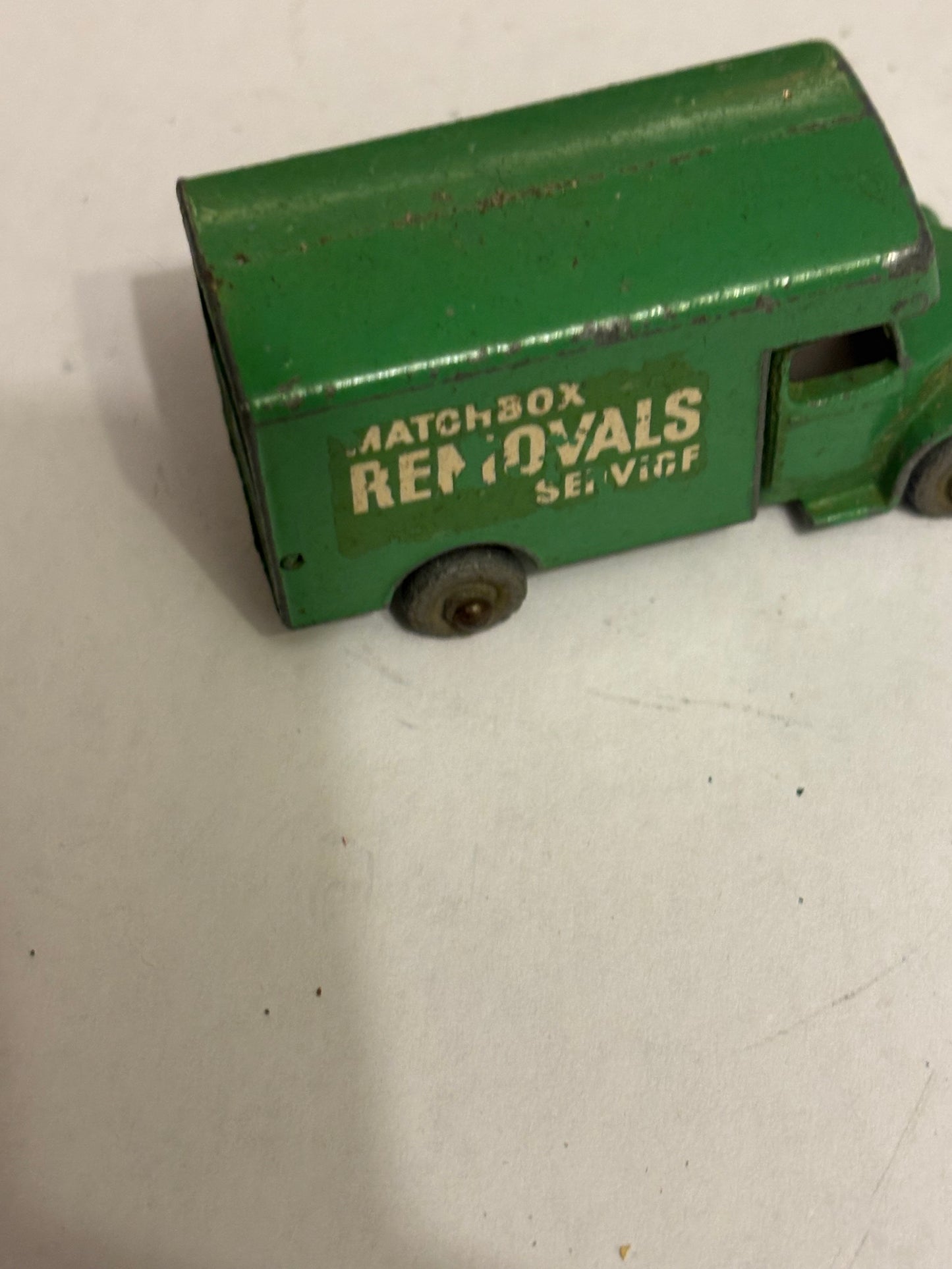 Vintage small green matchbox removals van