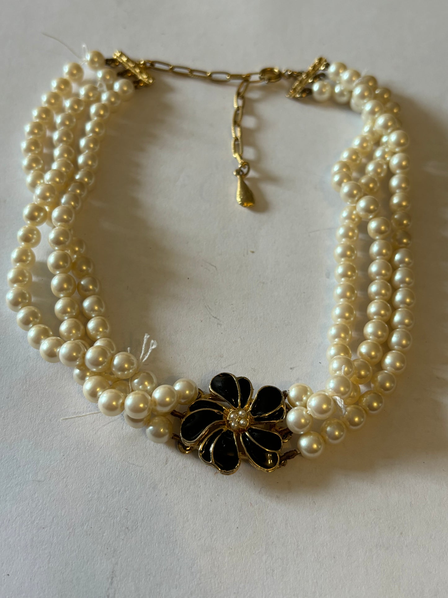 Triple Pearl style necklace with black stone flower