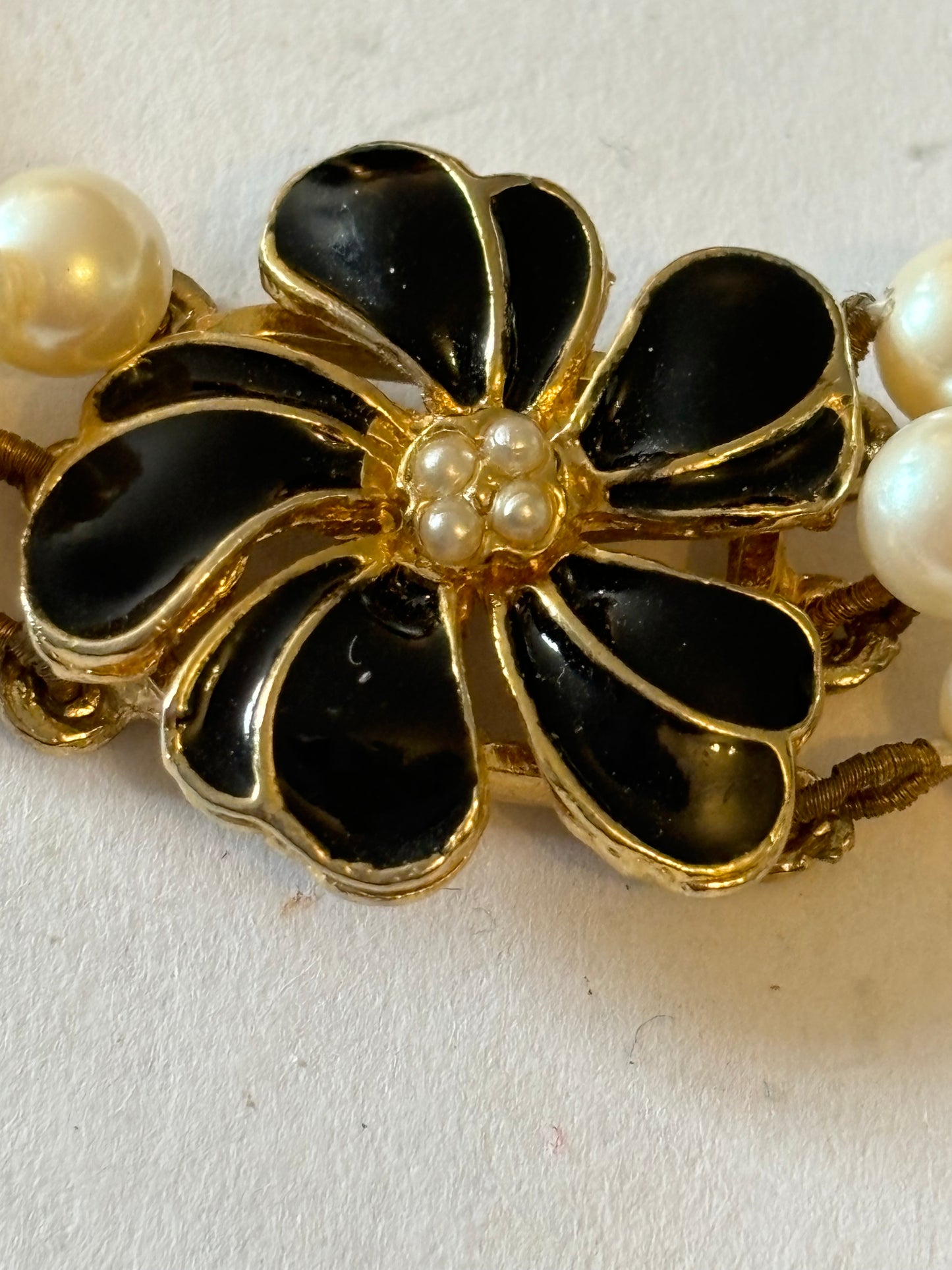 Triple Pearl style necklace with black stone flower