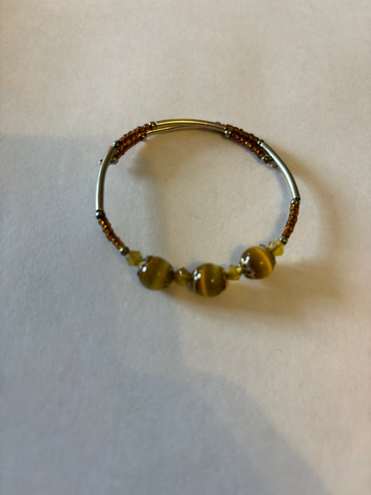 Adjustable wrap bangle with 3 glassy beads