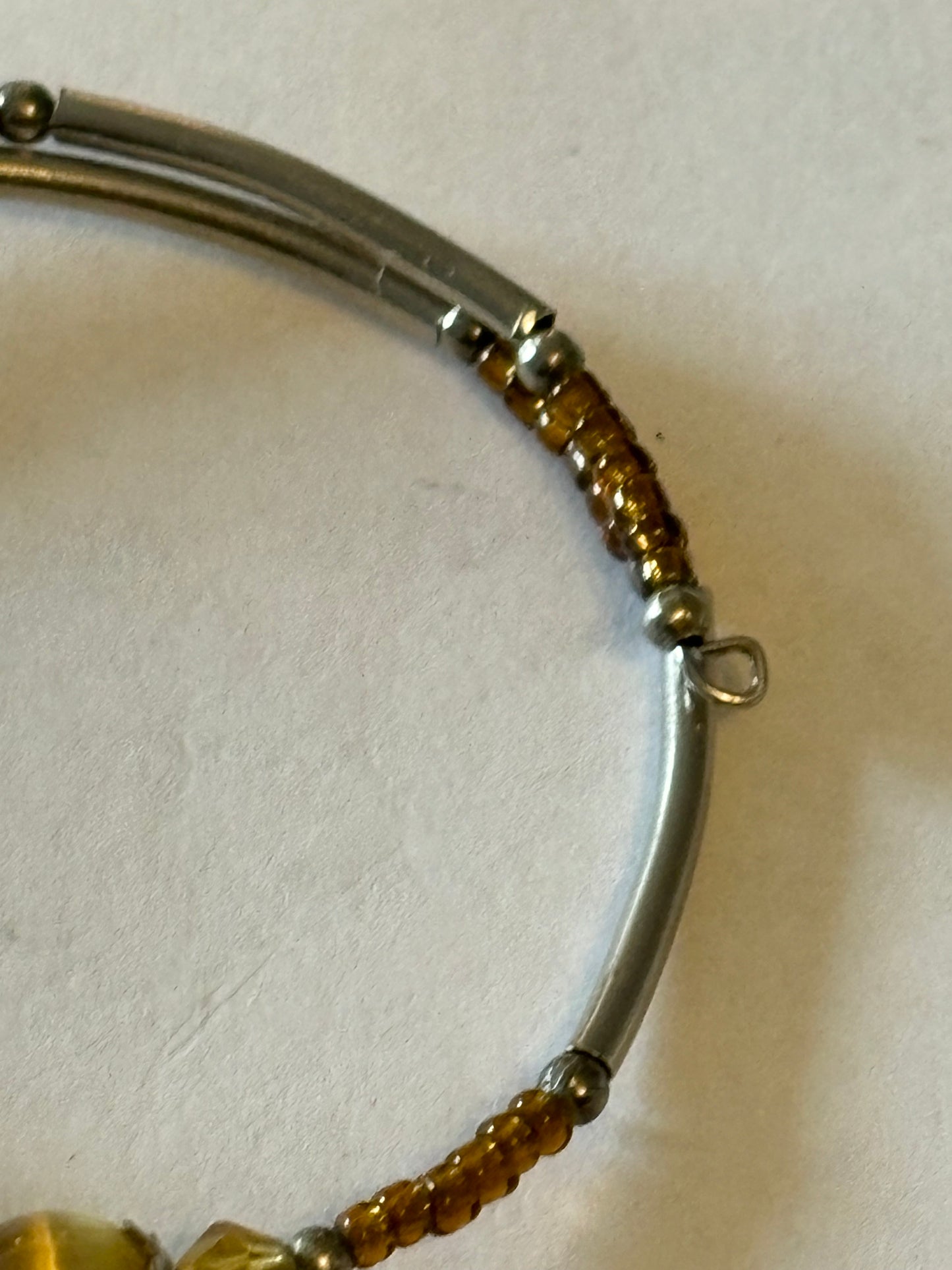 Adjustable wrap bangle with 3 glassy beads