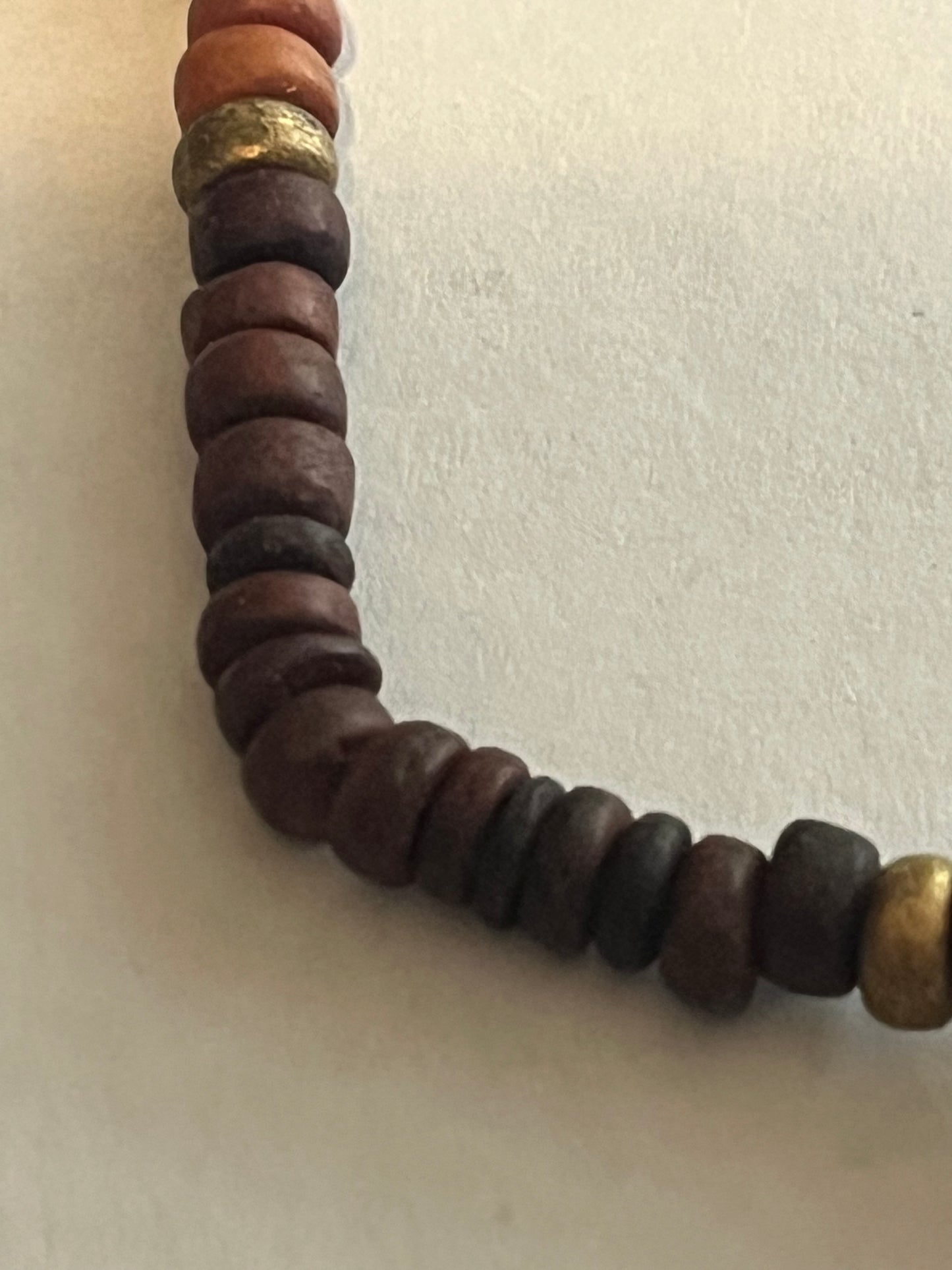 Wooden disc necklace with painted barrel bead