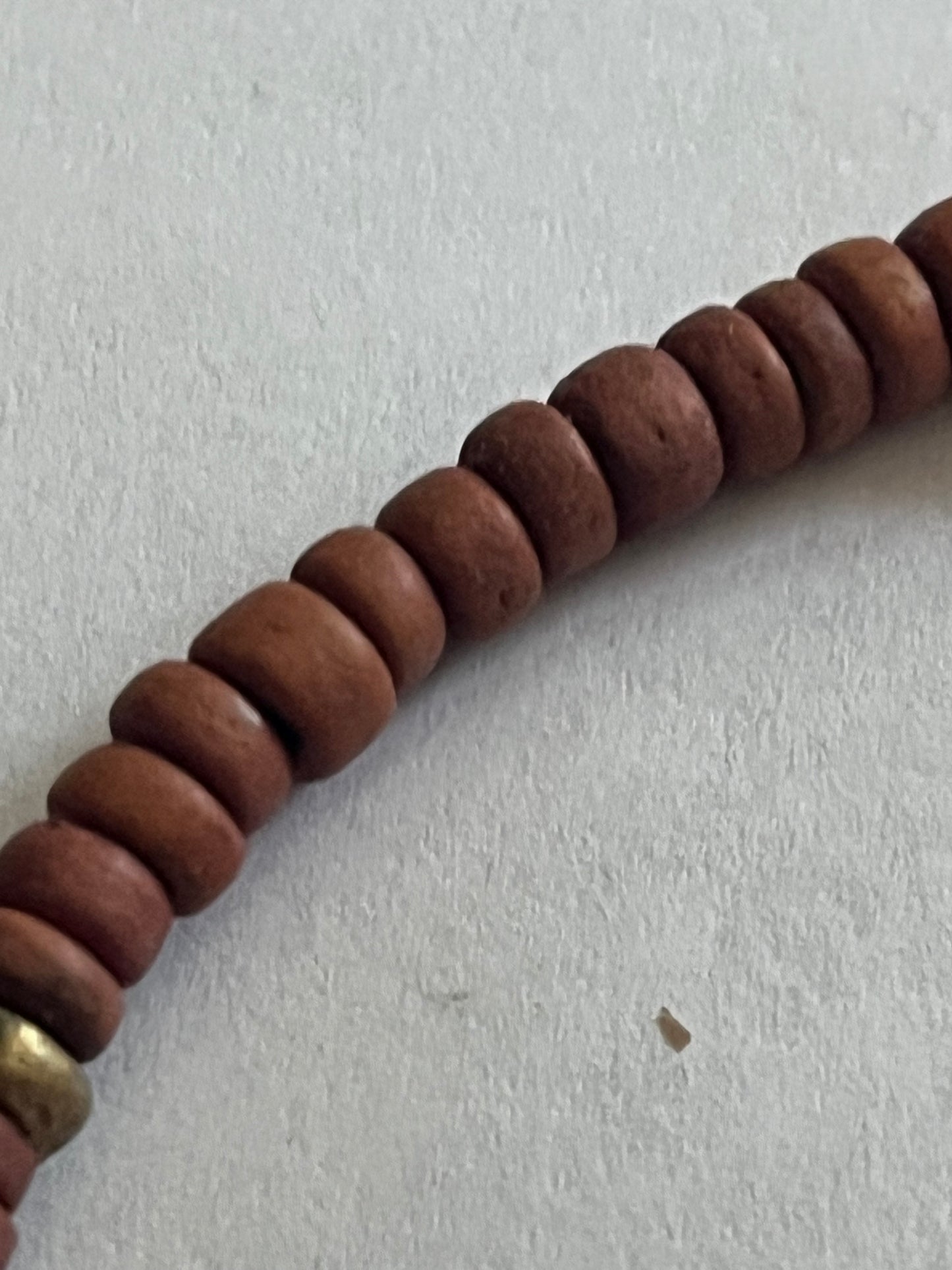 Wooden disc necklace with painted barrel bead