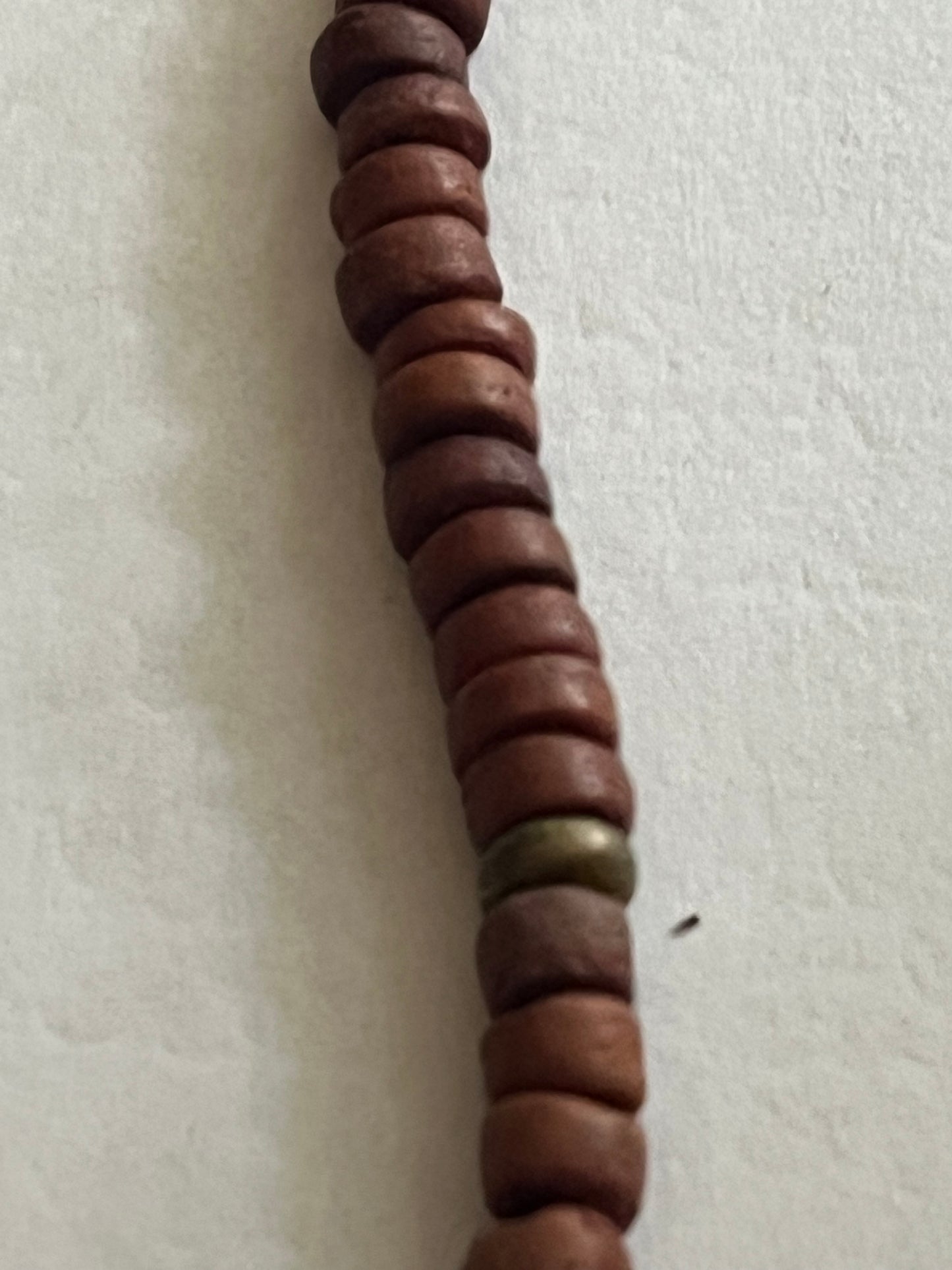 Wooden disc necklace with painted barrel bead