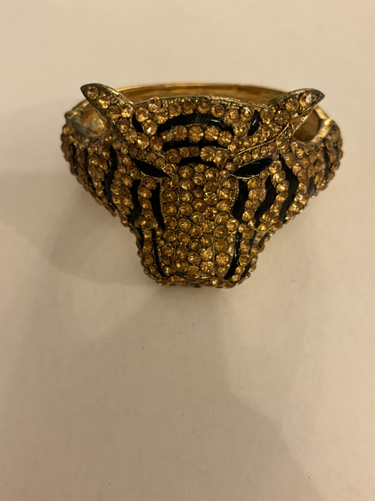 Heavy jewelled gold tiger bangle