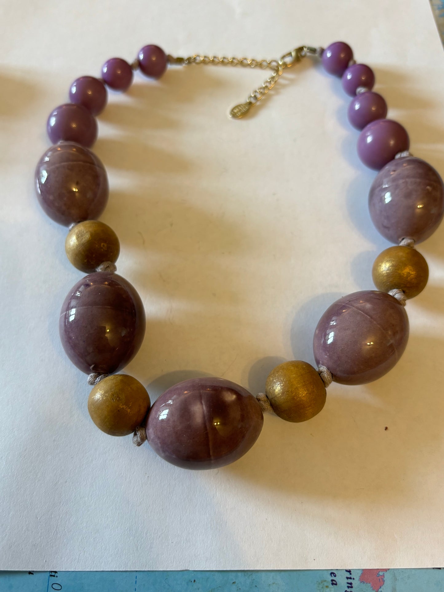 Large purple and wooden bead graduated necklace