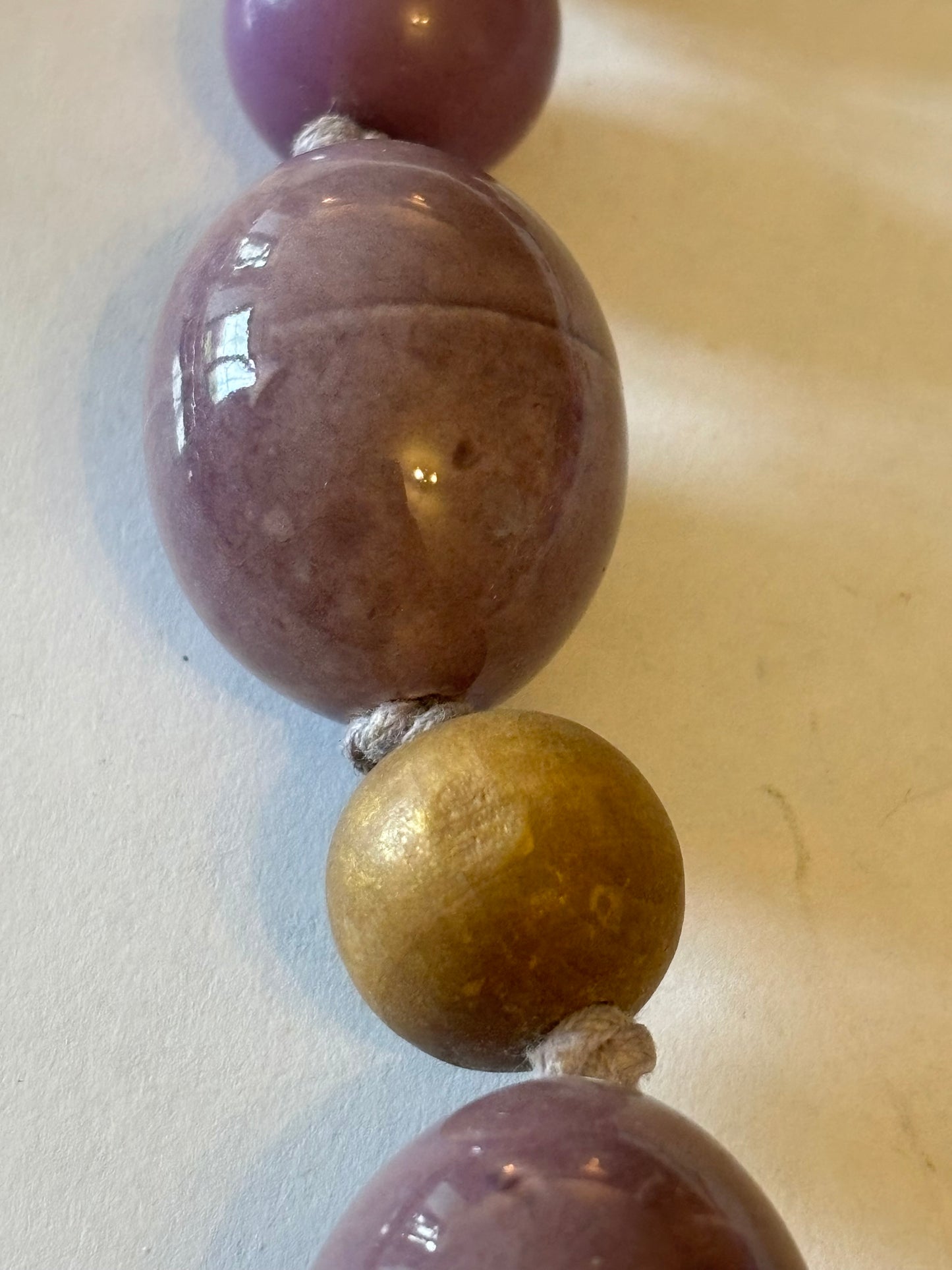 Large purple and wooden bead graduated necklace