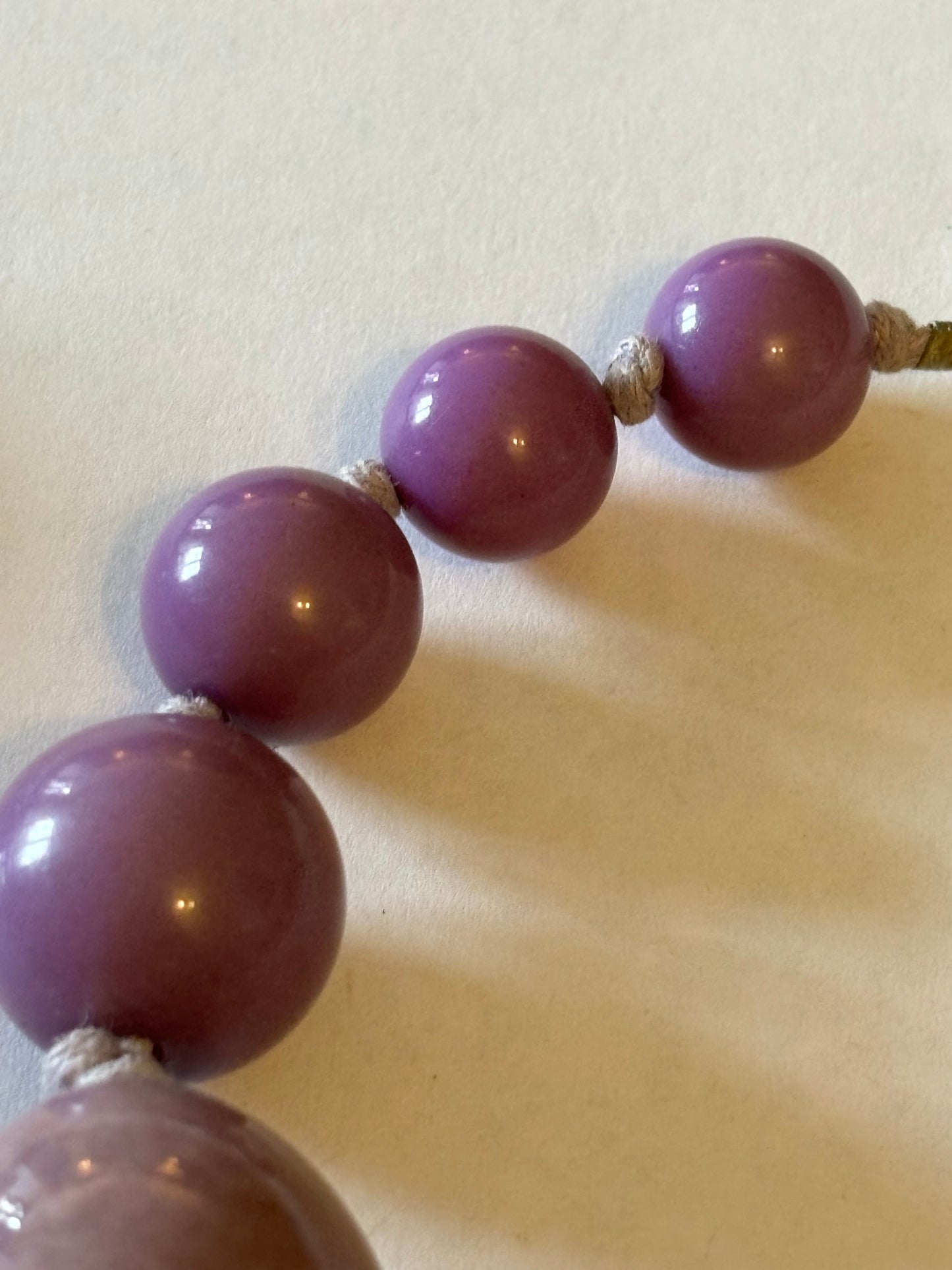 Large purple and wooden bead graduated necklace