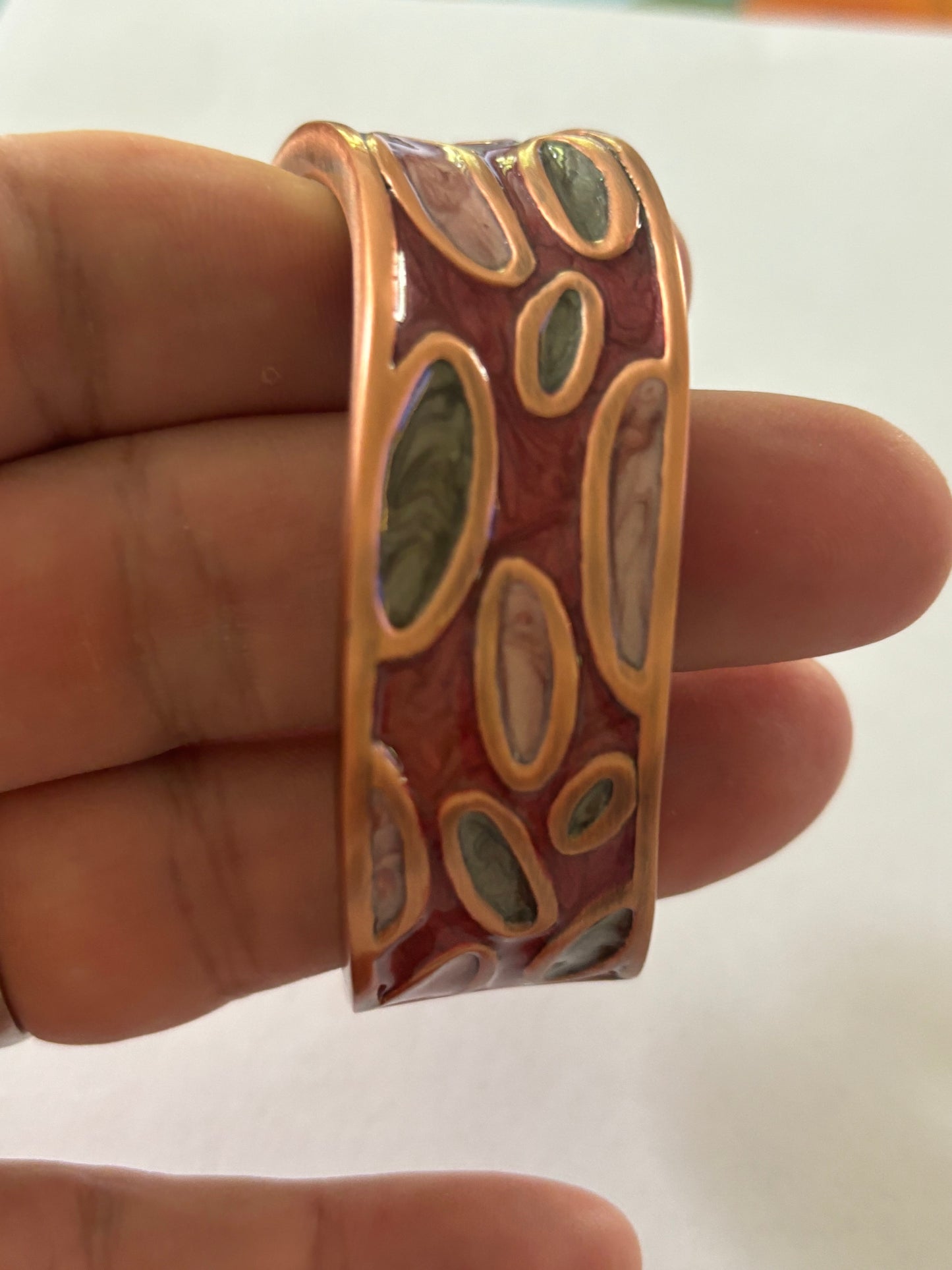 Wavy copper colour and enamel spring bangle