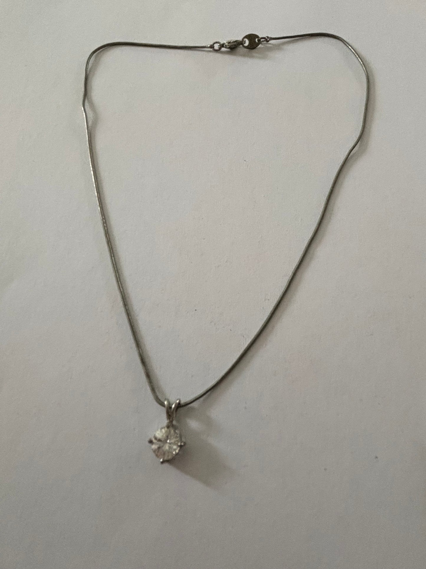 Smooth silver rope necklace with round stone pendant