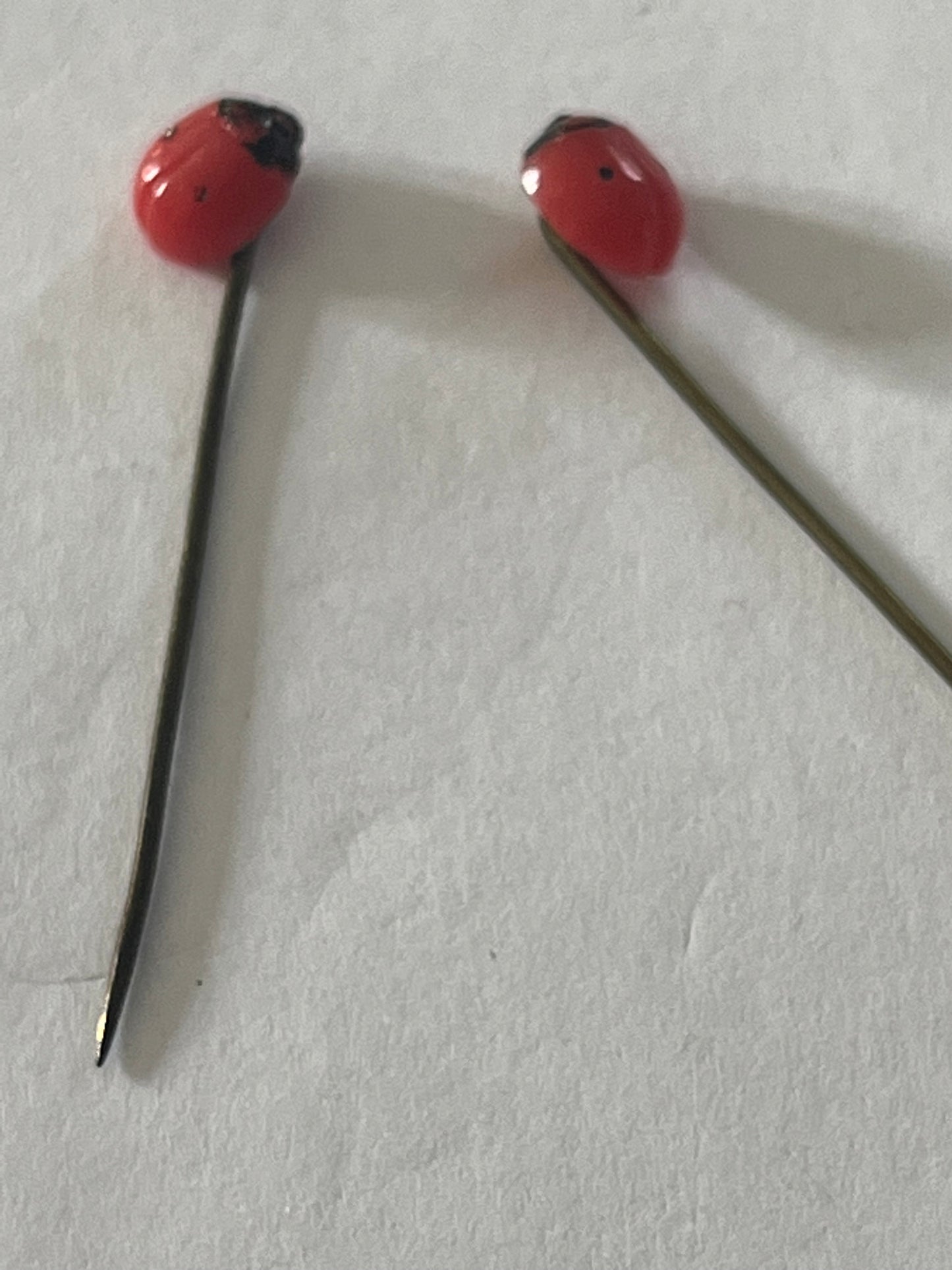 Pair of small ladybird hatpin/stick pins