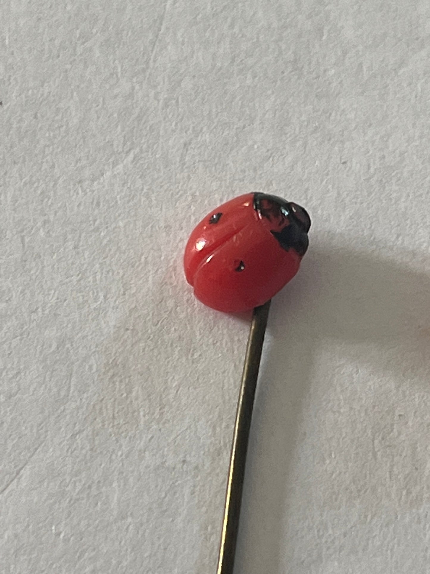 Pair of small ladybird hatpin/stick pins