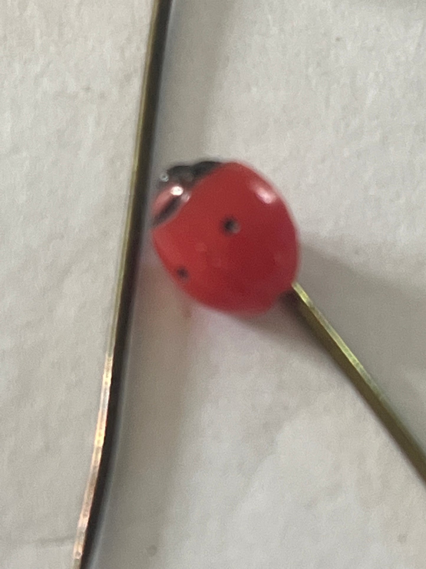 Pair of small ladybird hatpin/stick pins