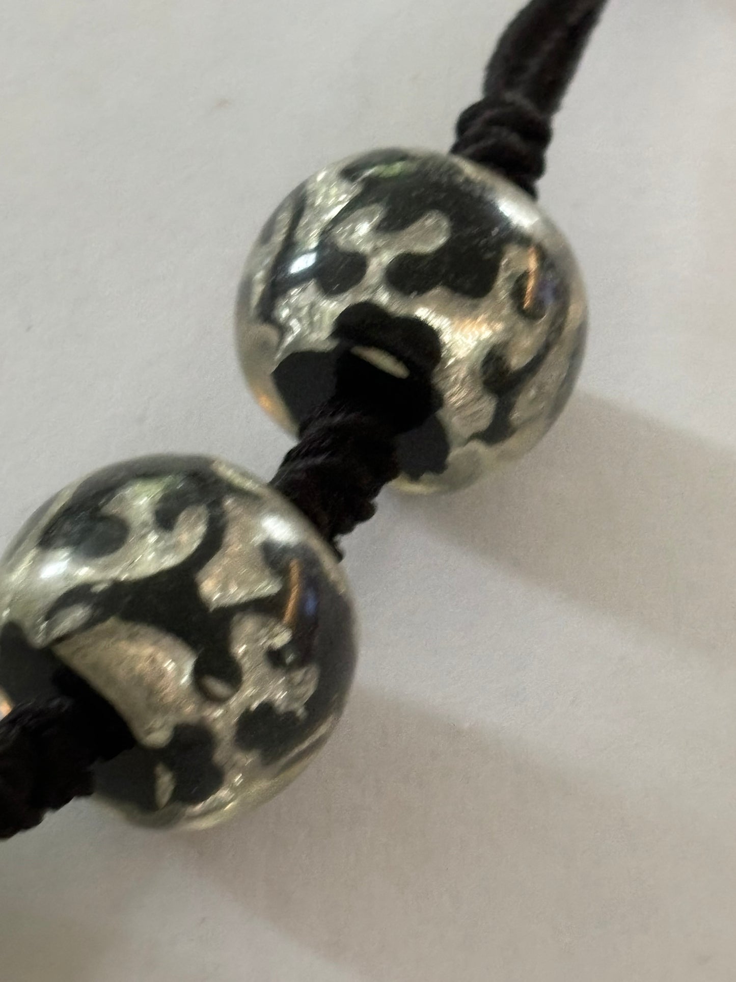 Black and Silver glassy bead necklace on string with T-Bar clasp