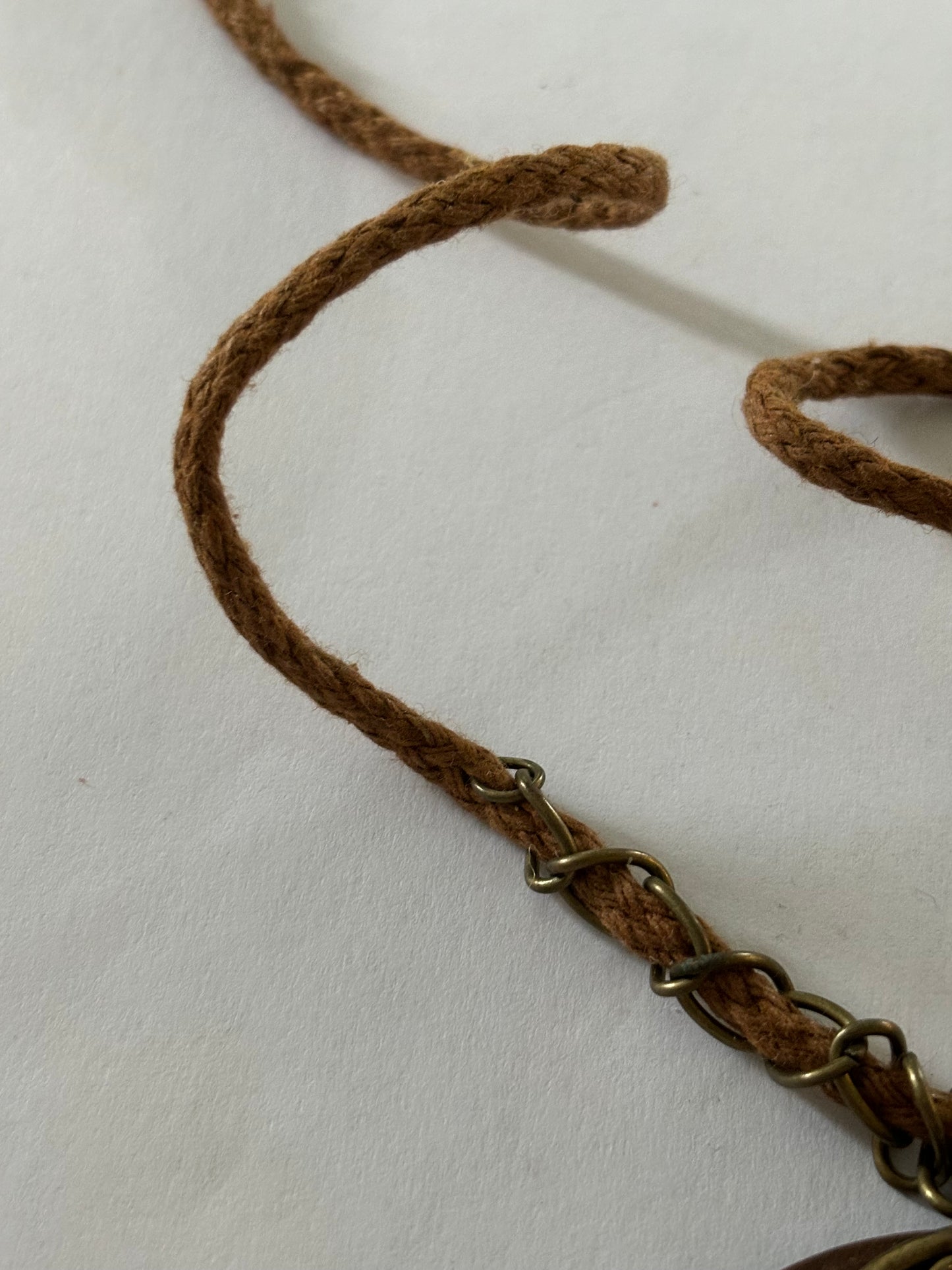 Rope necklace with wooden and fleur de lis pendant