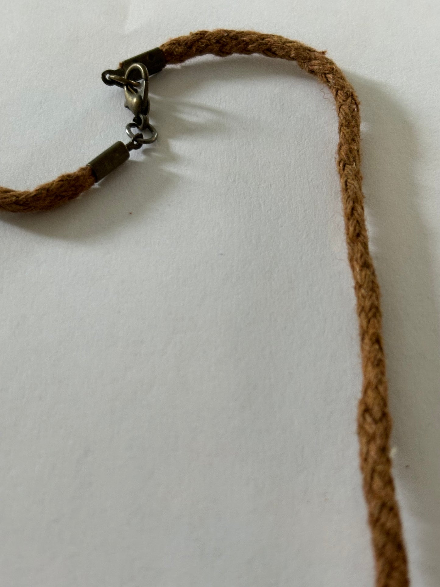 Rope necklace with wooden and fleur de lis pendant