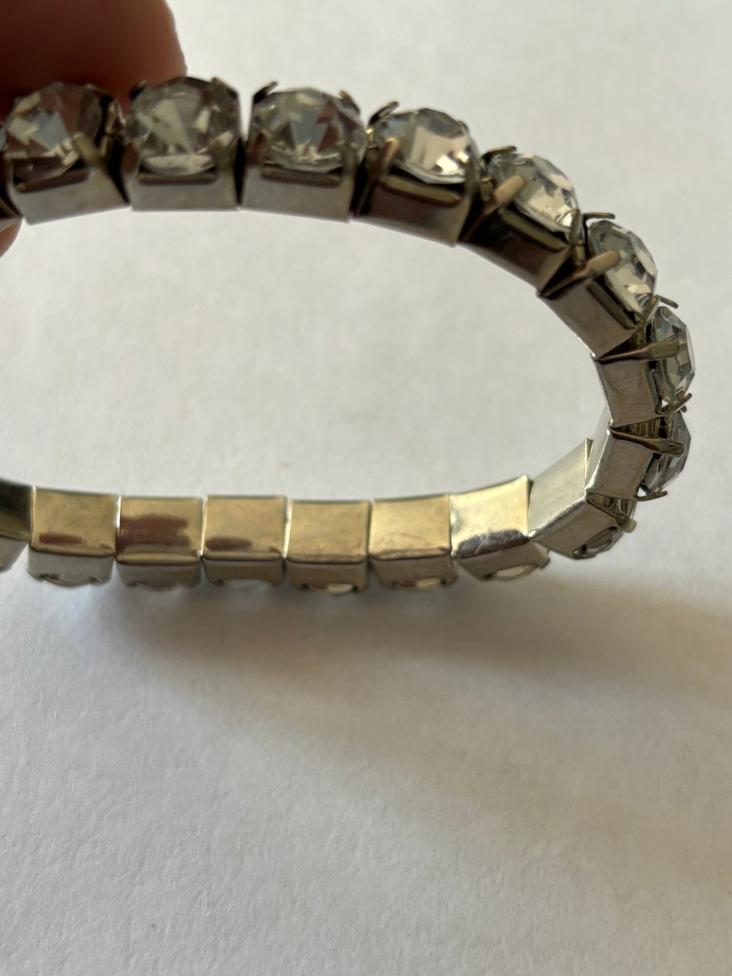 Brass coloured stretch square link bracelet with white stones