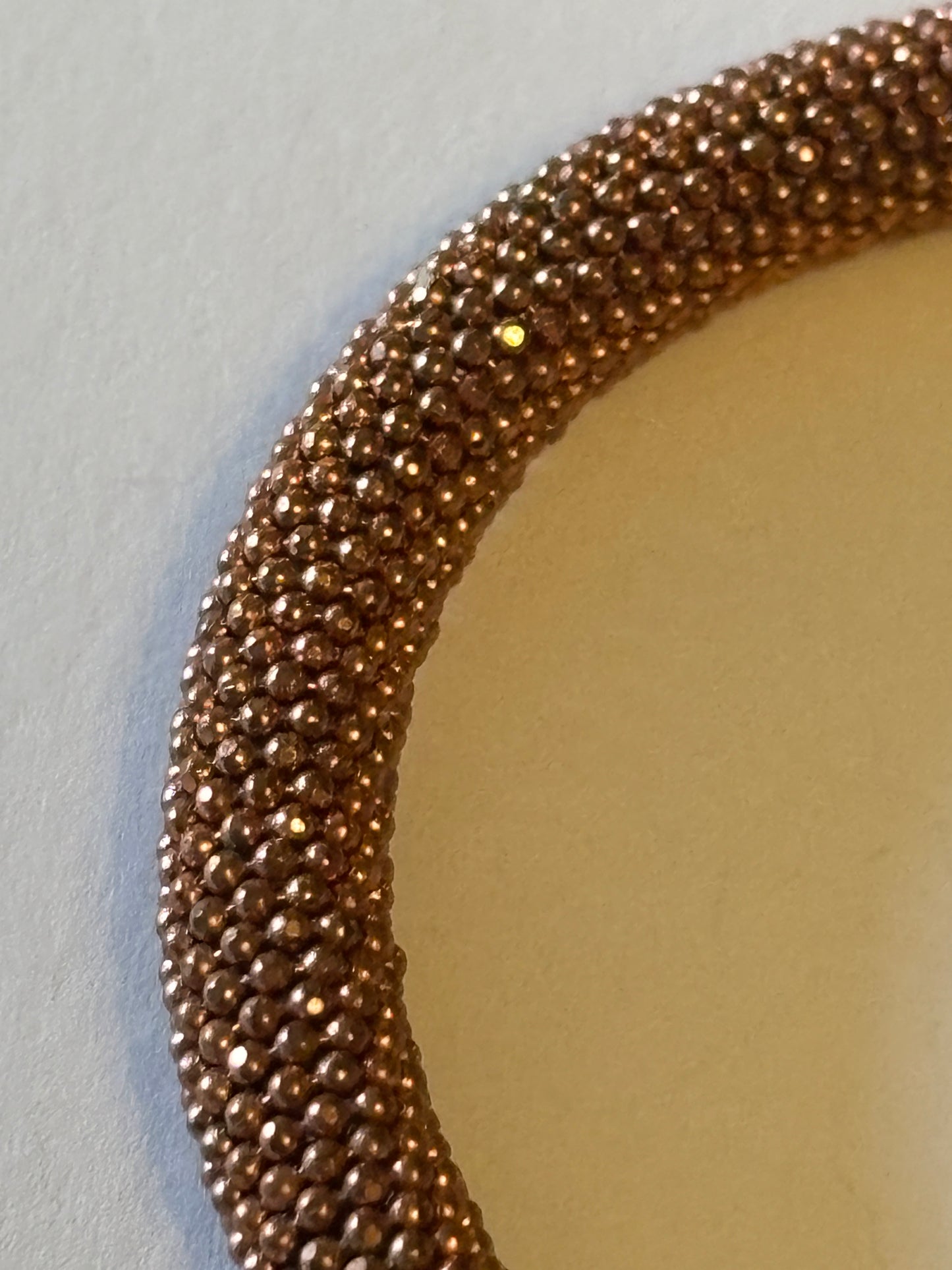 Copper coloured wire mesh tube bangle with magnet clasp