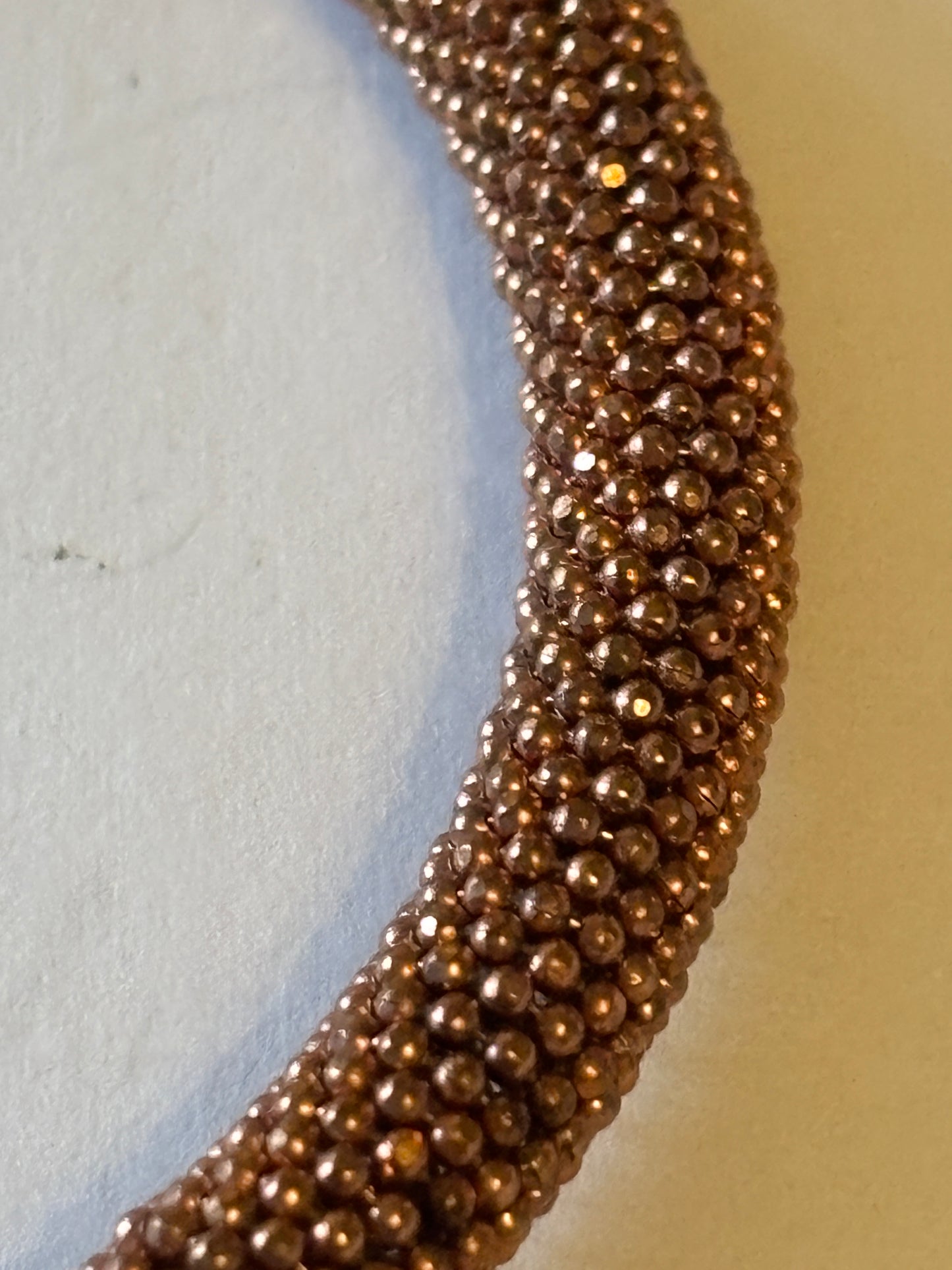 Copper coloured wire mesh tube bangle with magnet clasp