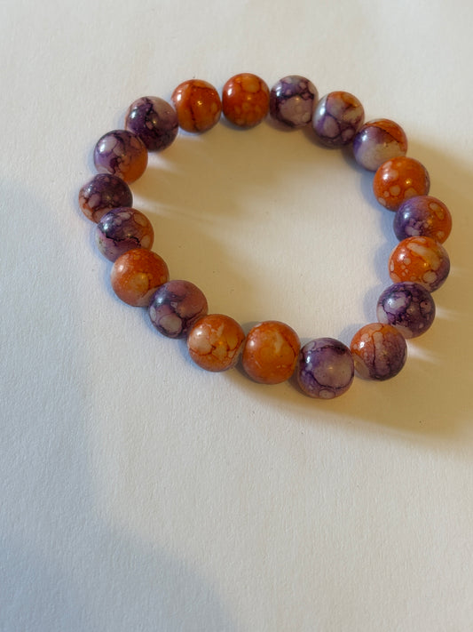 Marbled orange and purple round bead bracelet