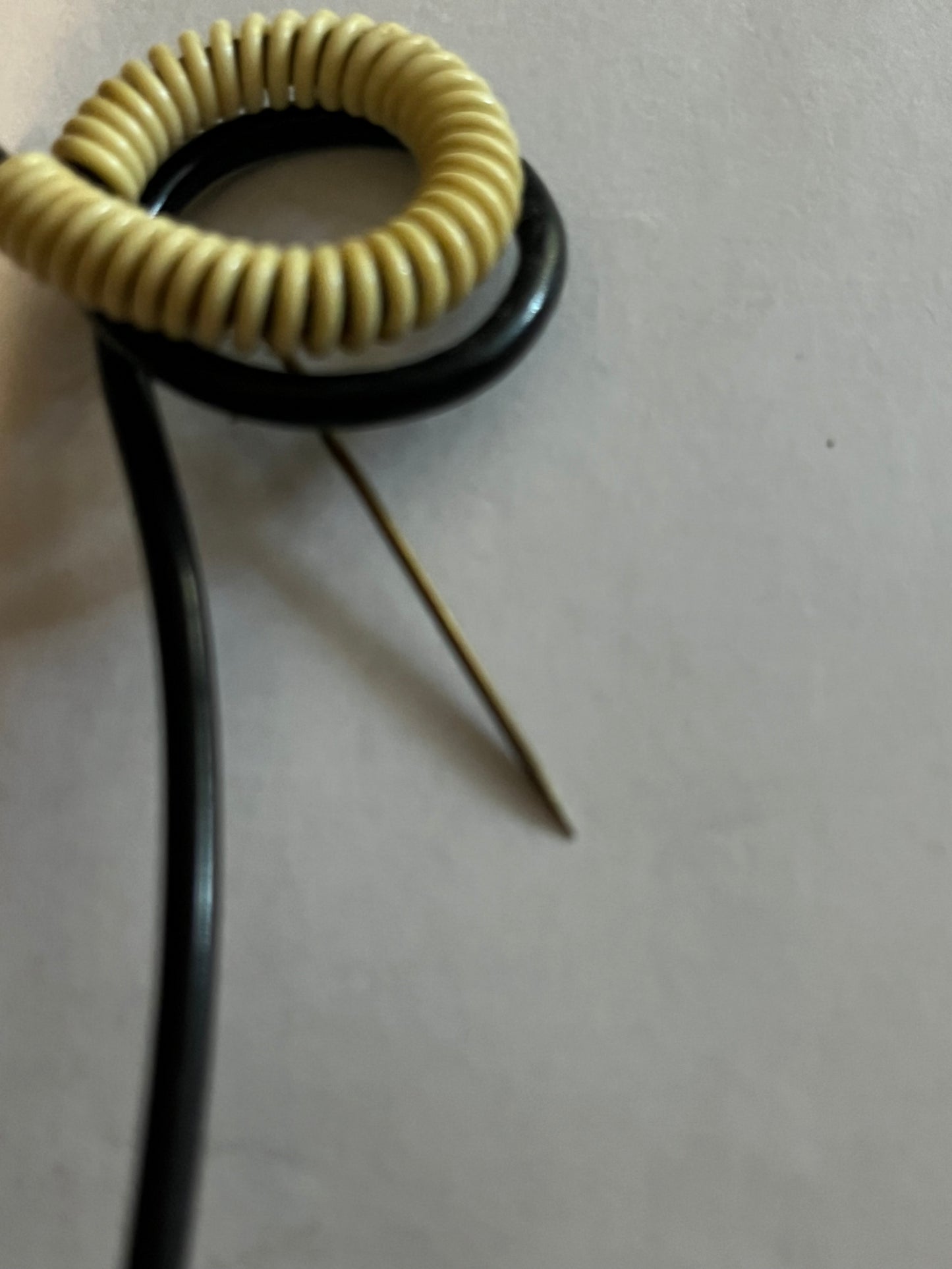 Unusual abstract black tube and white coil hatpin/brooch