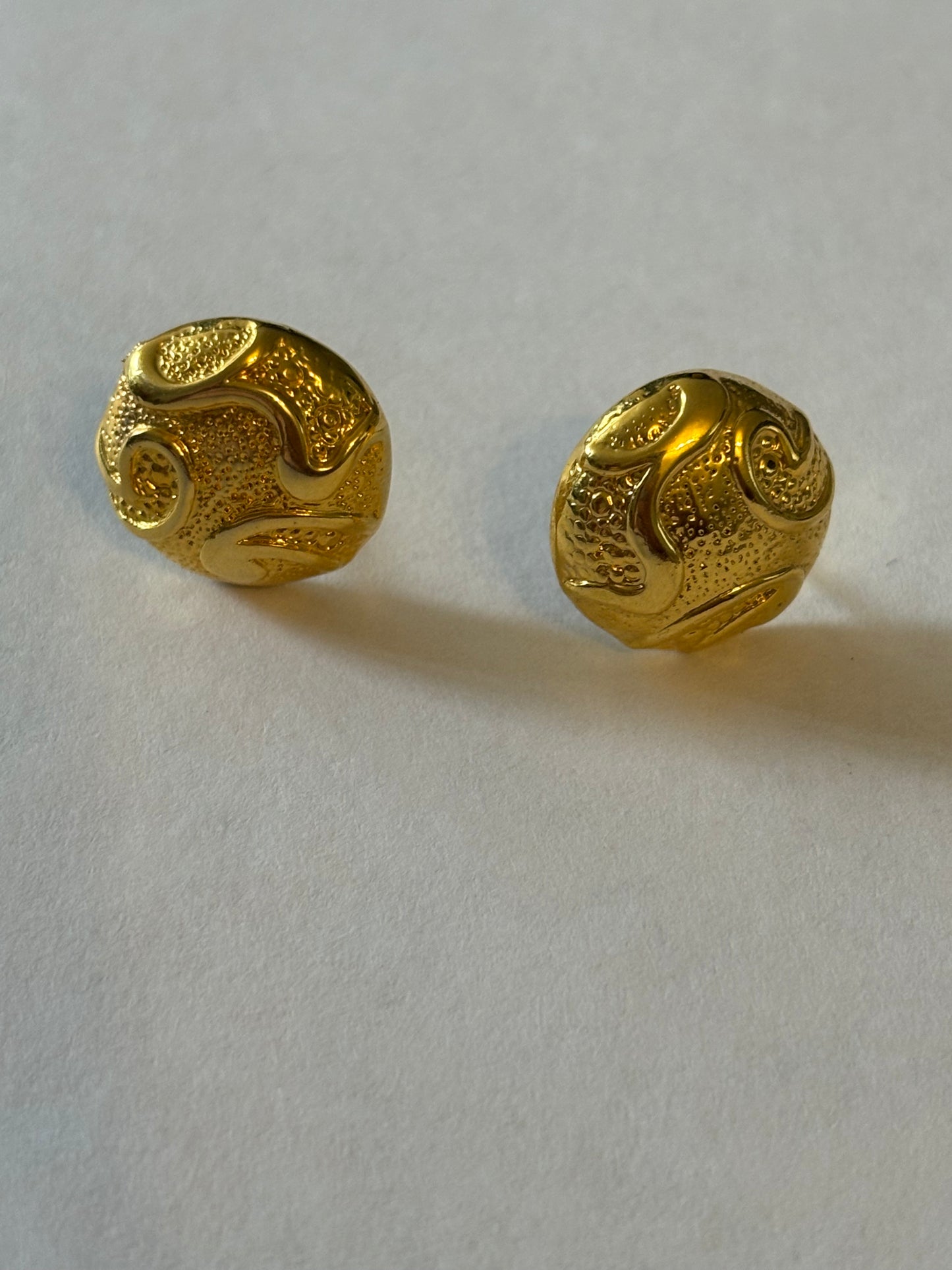 Heavy textured round gold metal stud earrings