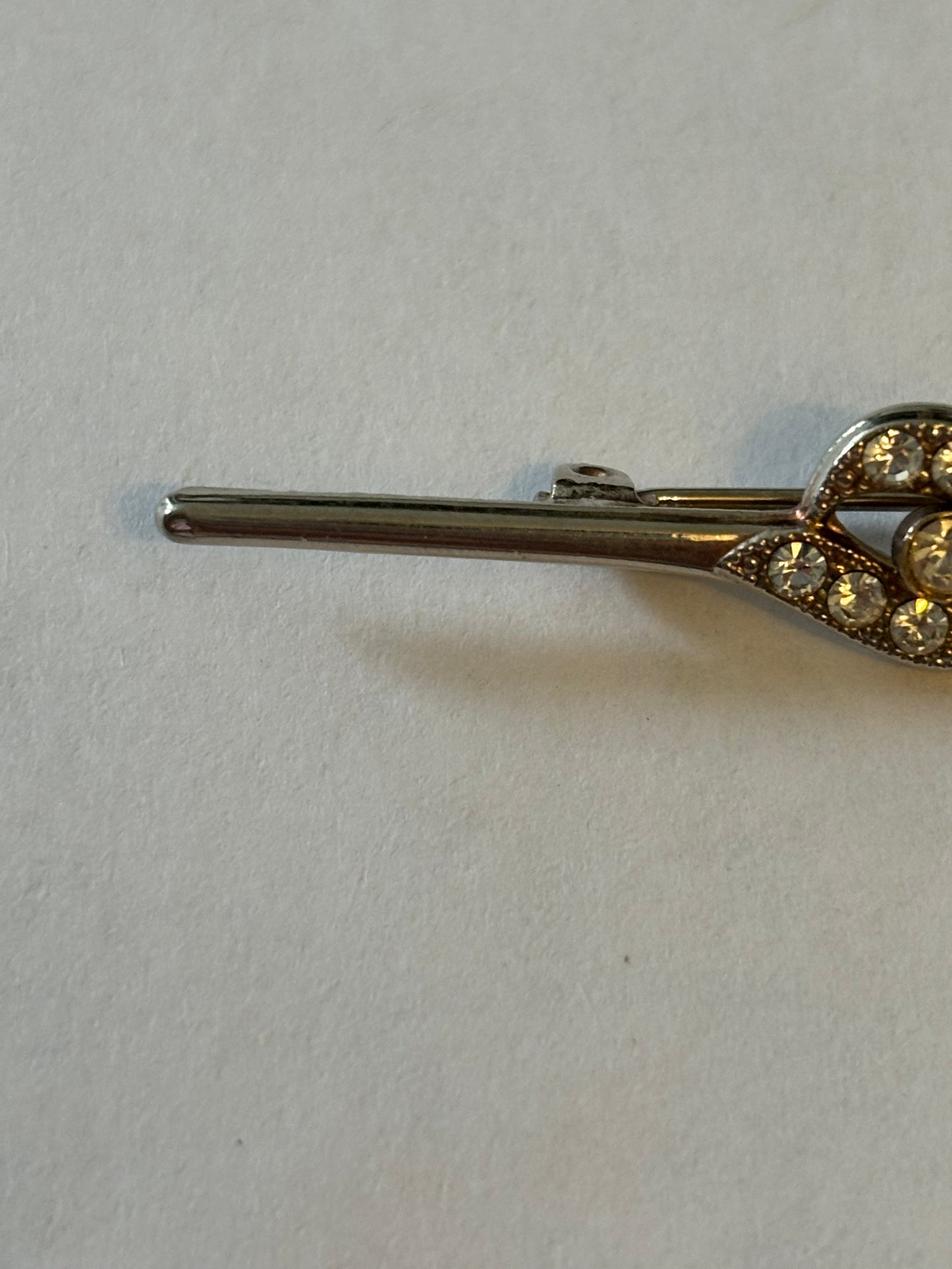 Silver metal bar brooch with diamante grouping