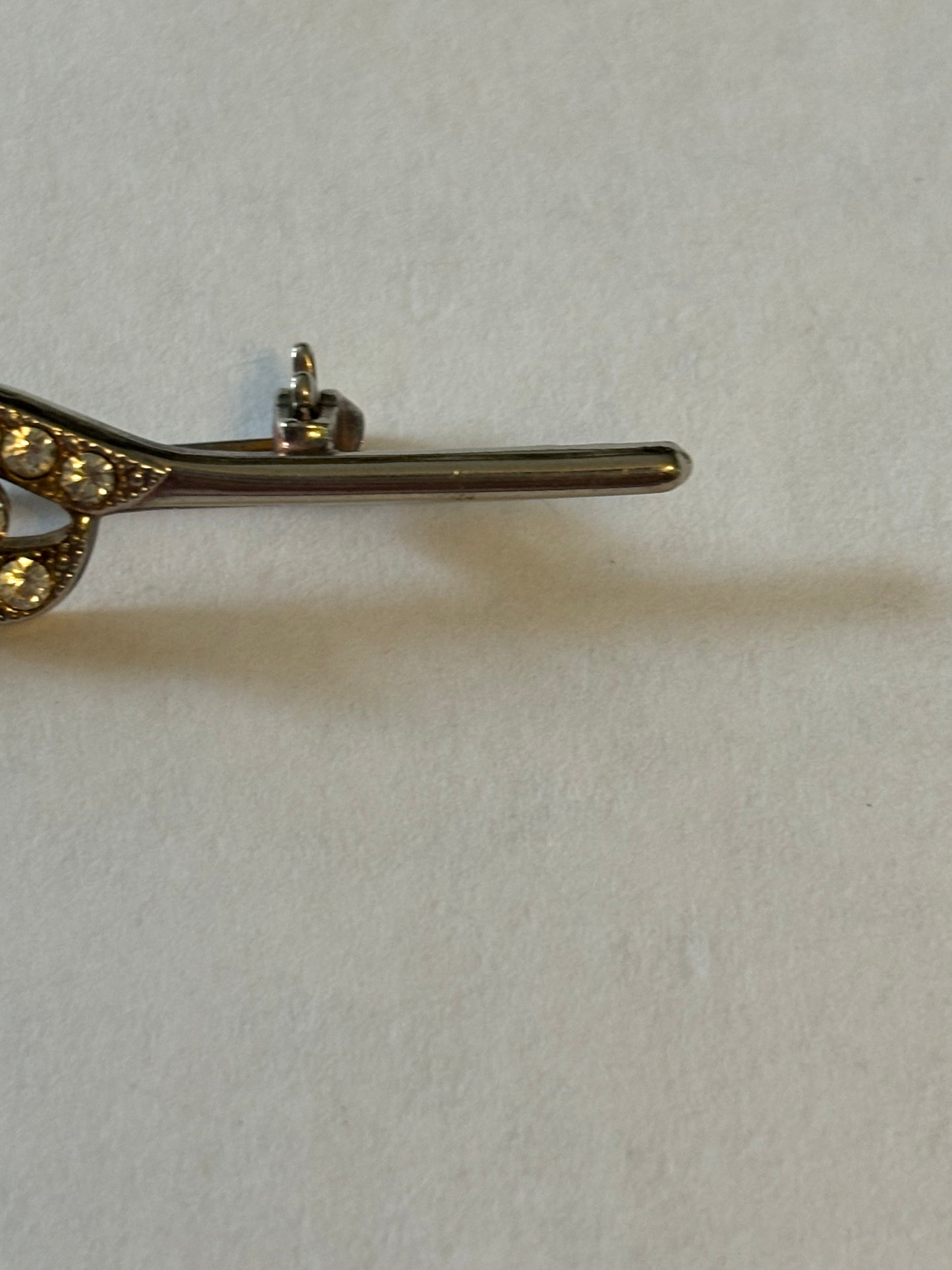 Silver metal bar brooch with diamante grouping